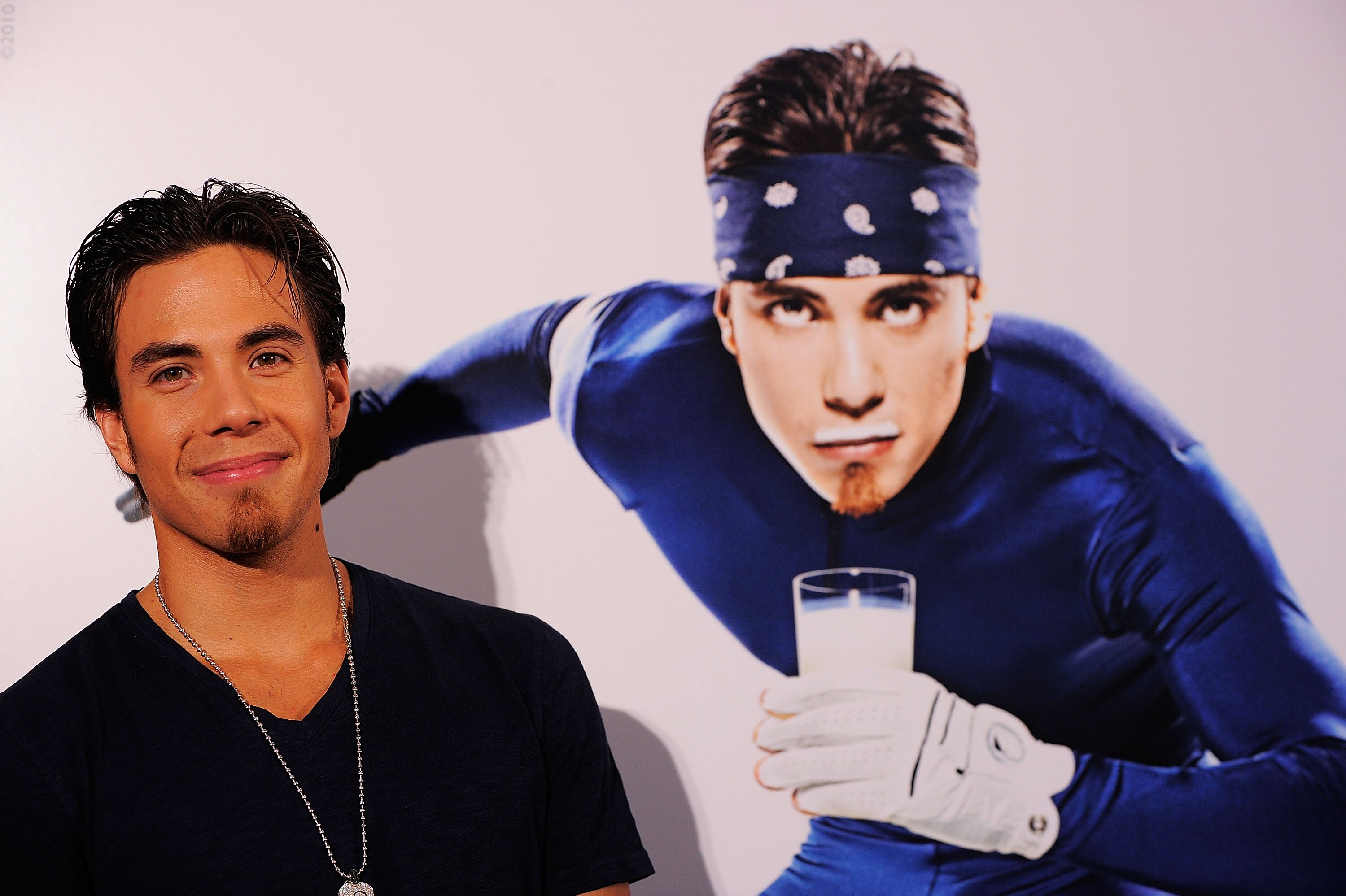NEW YORK - AUGUST 11: Gold Medalist Apolo Anton Ohno launches the Refuel America Program and unveils the newest Milk Mustache ads at the 92nd Street Y on August 11, 2010 in New York City. Gold medalists Chris Bosh, Apolo Anton Ohno and Shawn Johnson tea NEW YORK - AUGUST 11: Gold Medalist Apolo Anton Ohno launches the Refuel America Program and unveils the newest Milk Mustache ads at the 92nd Street Y on August 11, 2010 in New York City. Gold medalists Chris Bosh, Apolo Anton Ohno and Shawn Johnson tea