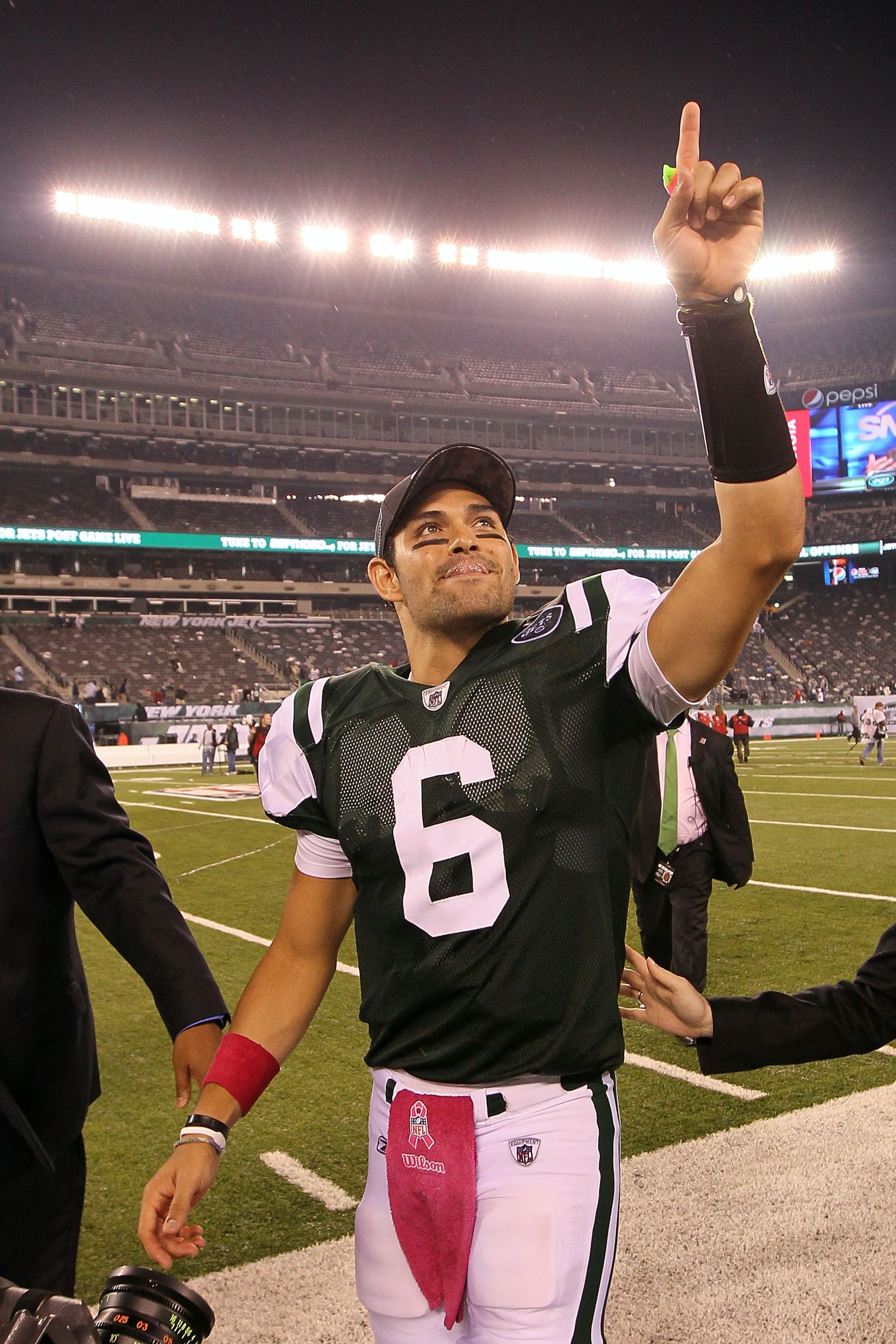 EAST RUTHERFORD, NJ - OCTOBER 11:  Quarterback Mark Sanchez #6 of the New York Jets celebrates as he walks off the field after the Jets won 29-20 against the Minnesota Vikings at New Meadowlands Stadium on October 11, 2010 in East Rutherford, New Jersey.