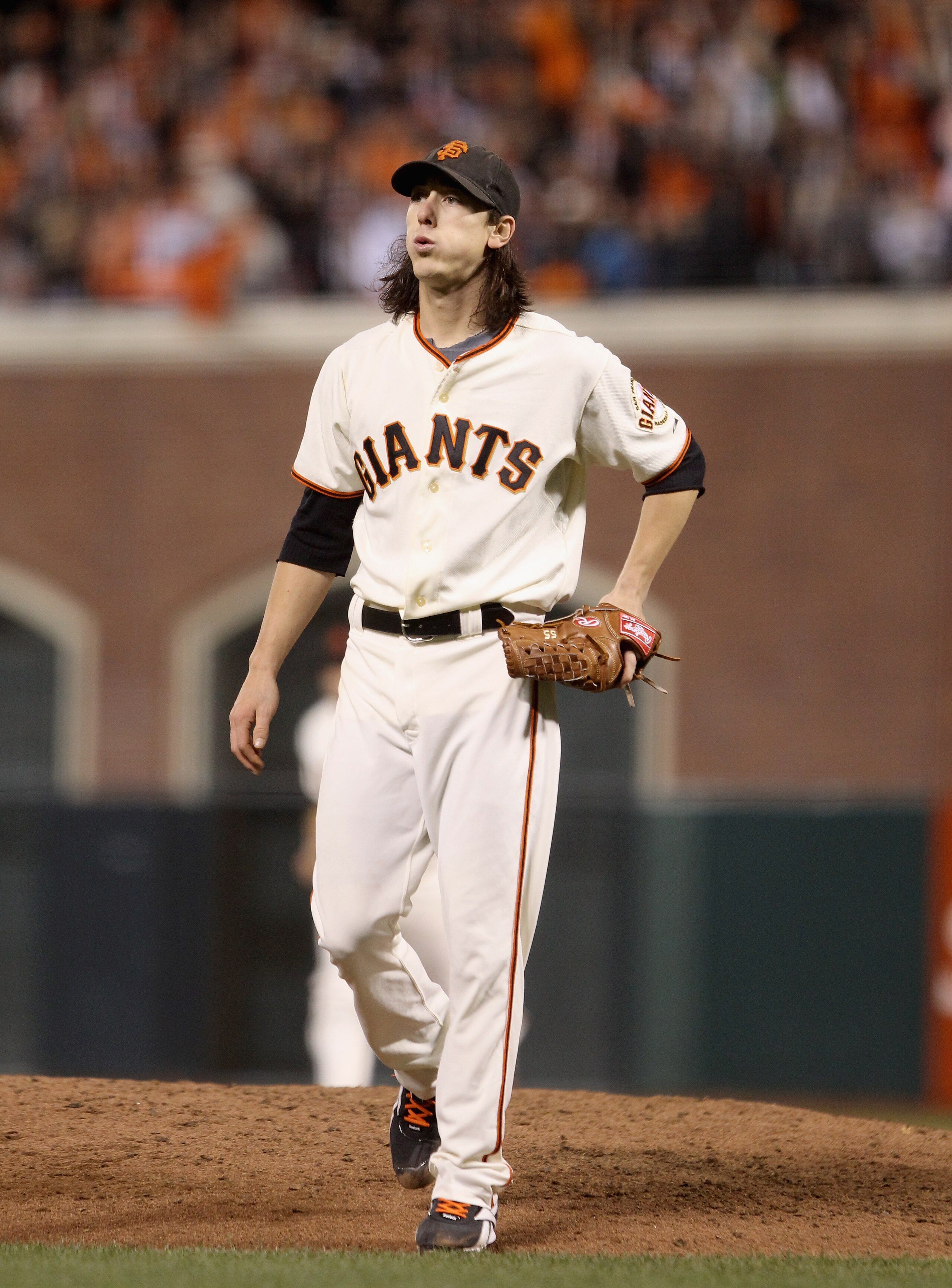 SAN FRANCISCO - OCTOBER 07:  Tim Lincecum #55 of the San Francisco Giants reacts while pitching against the Atlanta Braves in game 1 of the NLDS at AT&T Park on October 7, 2010 in San Francisco, California.  (Photo by Ezra Shaw/Getty Images)