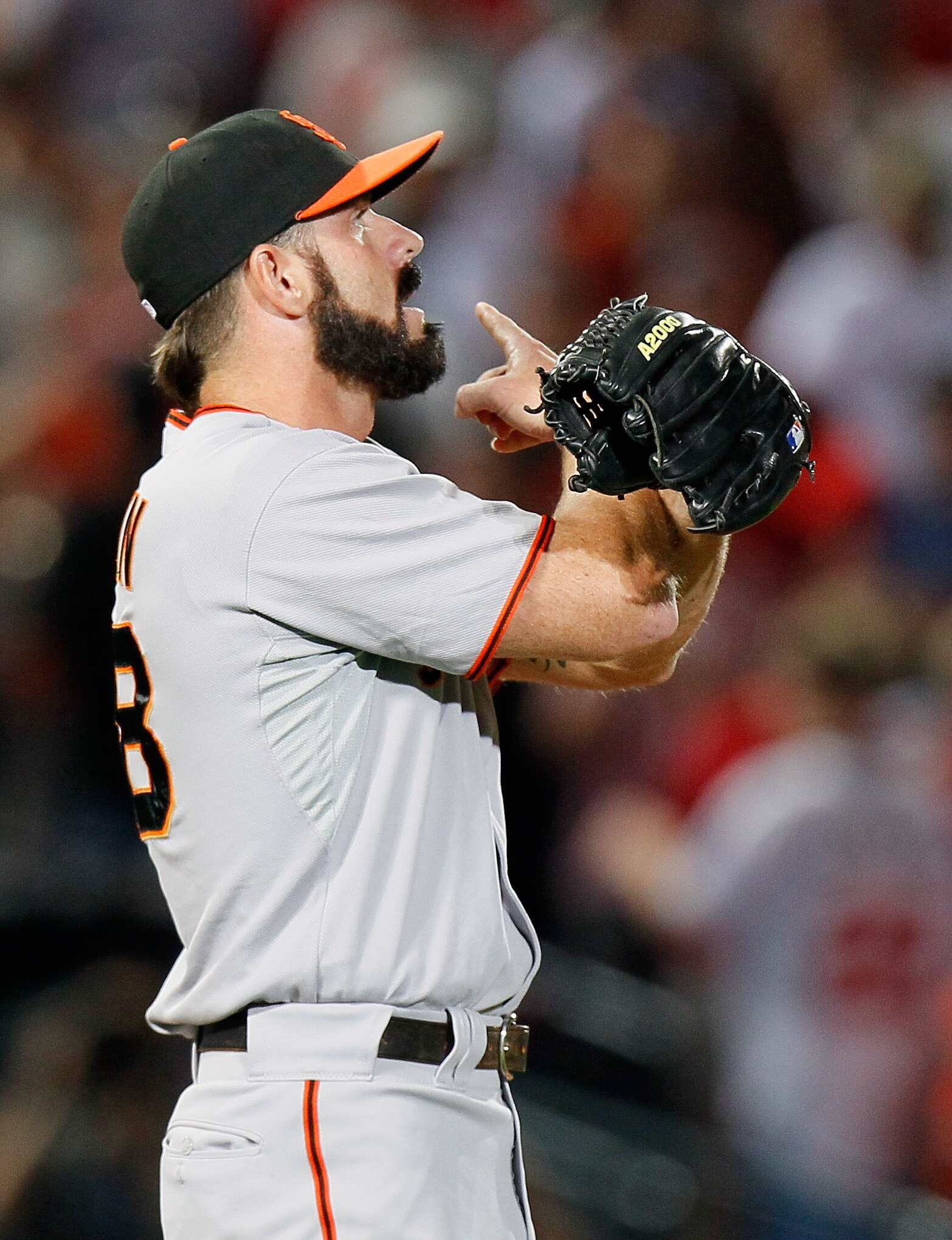 ATLANTA - OCTOBER 10:  Closing pitcher Brian Wilson #38 of the San Francisco Giants reacts after their 3-2 win against the Atlanta Braves during Game Three of the NLDS of the 2010 MLB Playoffs at Turner Field on October 10, 2010 in Atlanta, Georgia.  (Pho