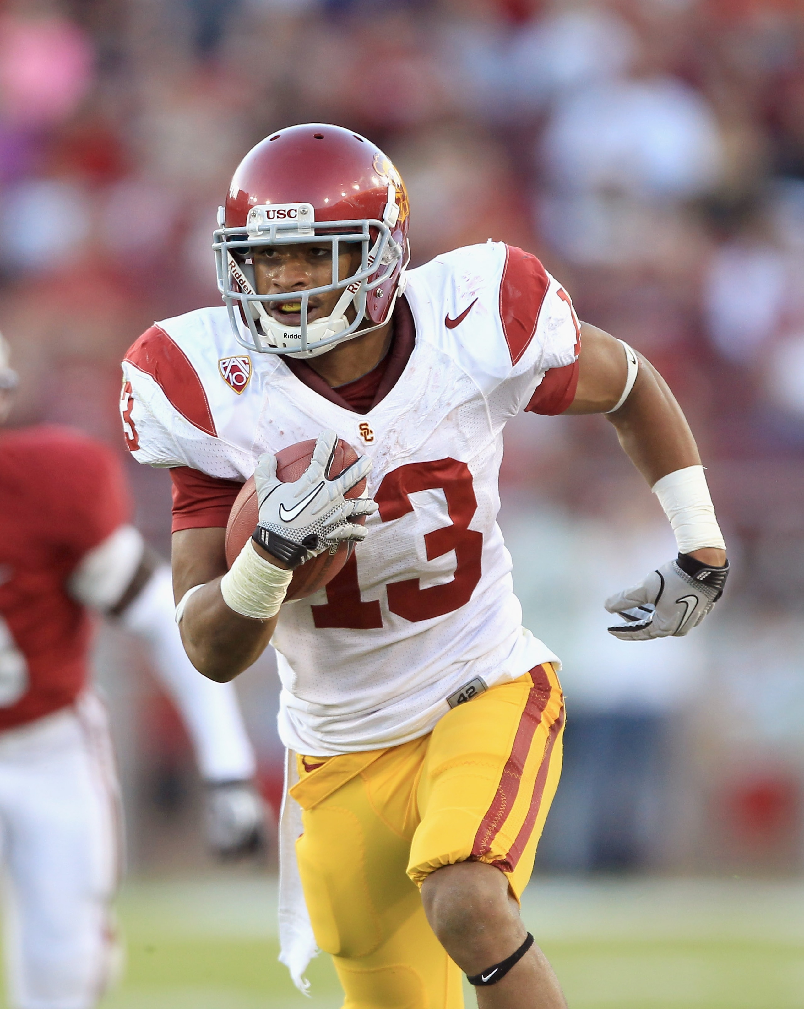 PALO ALTO, CA - OCTOBER 09:  Robert Woods #13 of the USC Trojans runs with the ball during their game against the Stanford Cardinal at Stanford Stadium on October 9, 2010 in Palo Alto, California.  (Photo by Ezra Shaw/Getty Images)