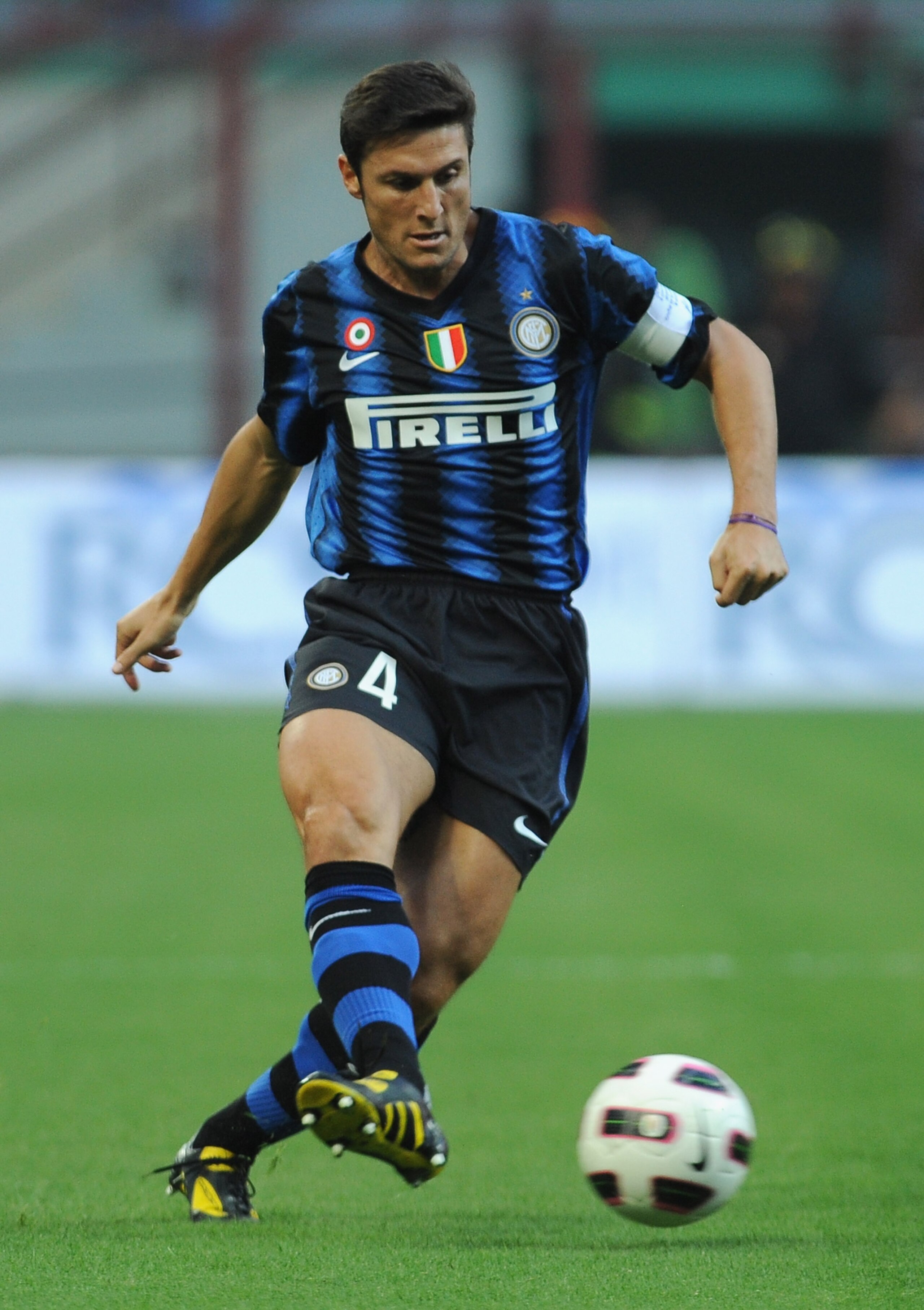 MILAN, ITALY - SEPTEMBER 11:  Javier Zanetti  of FC Internazionale in action during the Serie A match between FC Internazionale and Udinese Calcio at Stadio Giuseppe Meazza on September 11, 2010 in Milan, Italy.  (Photo by Valerio Pennicino/Getty Images)