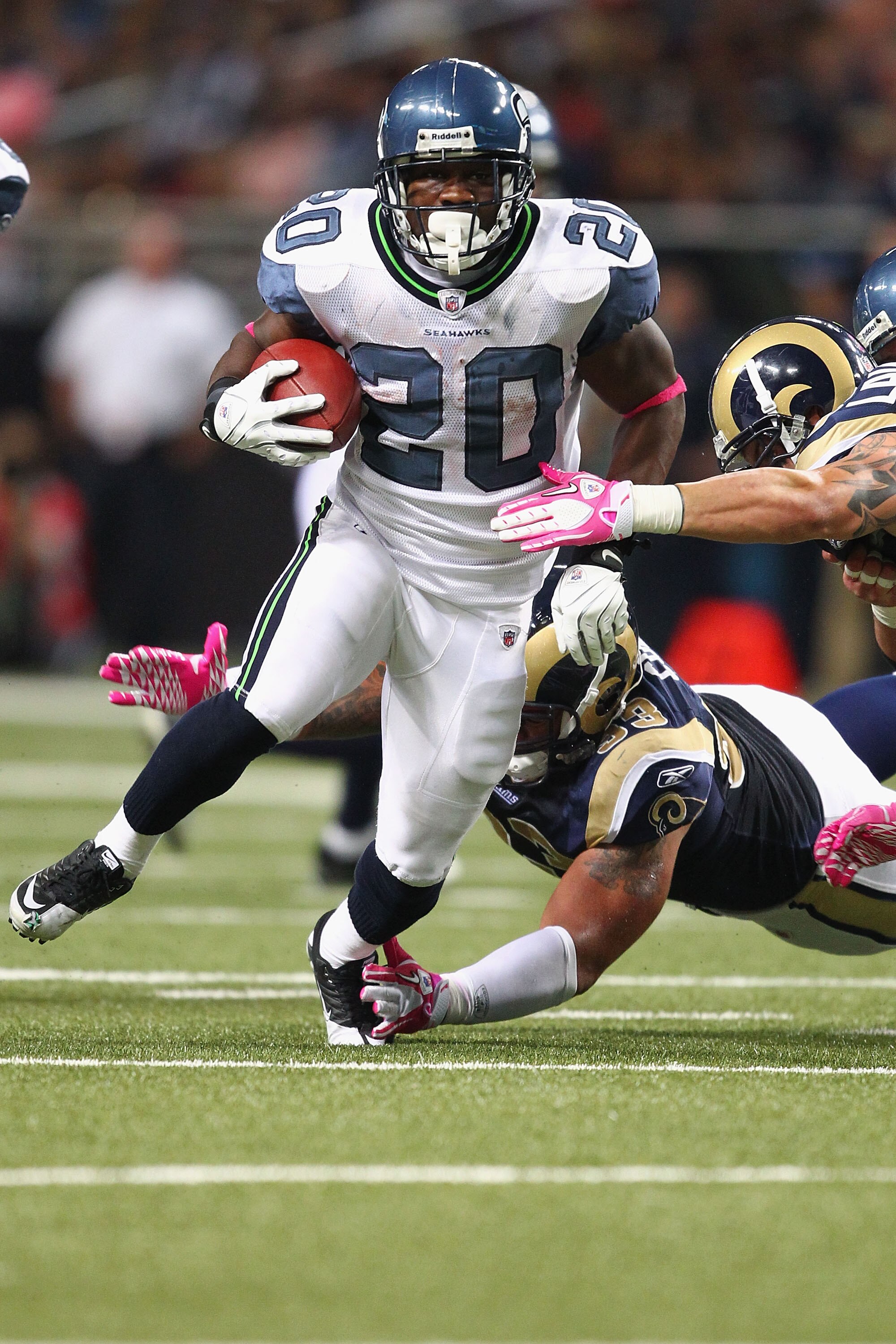 ST. LOUIS - OCTOBER 3: Justin Forsett #20 of the Seattle Seahawks rushes against the St. Louis Rams at the Edward Jones Dome on October 3, 2010 in St. Louis, Missouri.  The Rams beat the Seahawks 20-3.  (Photo by Dilip Vishwanat/Getty Images)