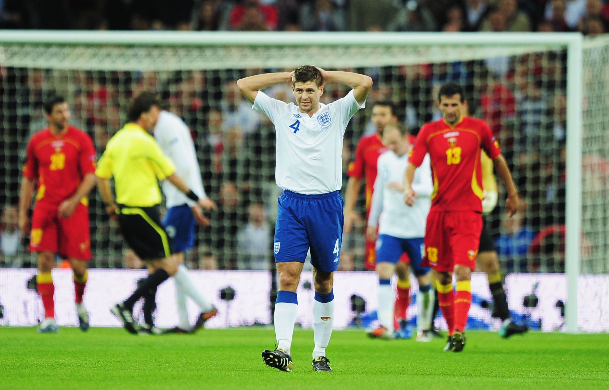 LONDON, ENGLAND - OCTOBER 12:  Steven Gerrard of England shows his frustration during the UEFA EURO 2012 Group G Qualifying match between England and Montenegro at Wembley Stadium on October 12, 2010 in London, England.  (Photo by Shaun Botterill/Getty Im
