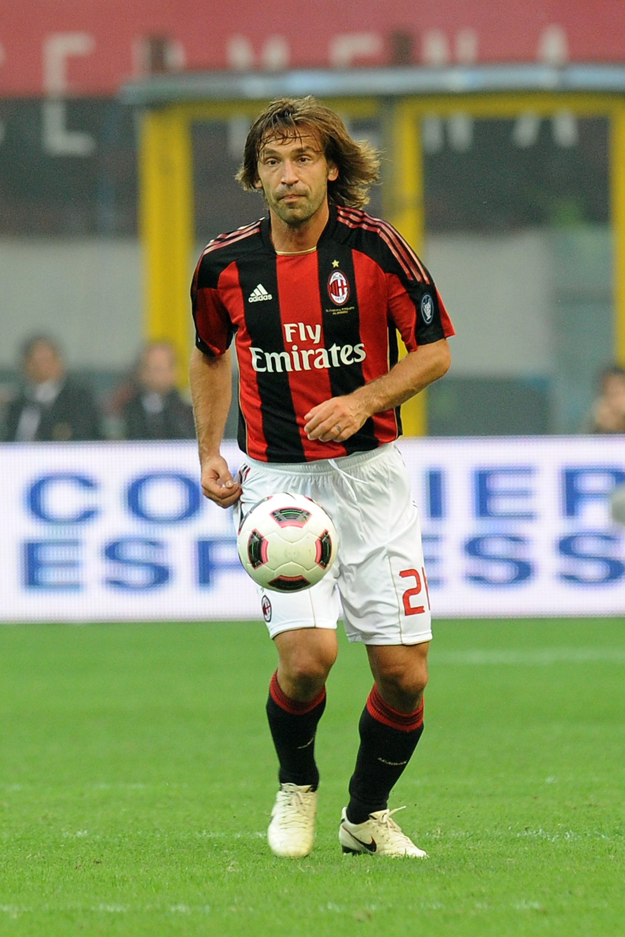 MILAN, ITALY - SEPTEMBER 26:  Andrea Pirlo of Milan in action during the Serie A match between AC Milan and Genoa CFC at Stadio Giuseppe Meazza on September 26, 2010 in Milan, Italy.  (Photo by Tullio M. Puglia/Getty Images)