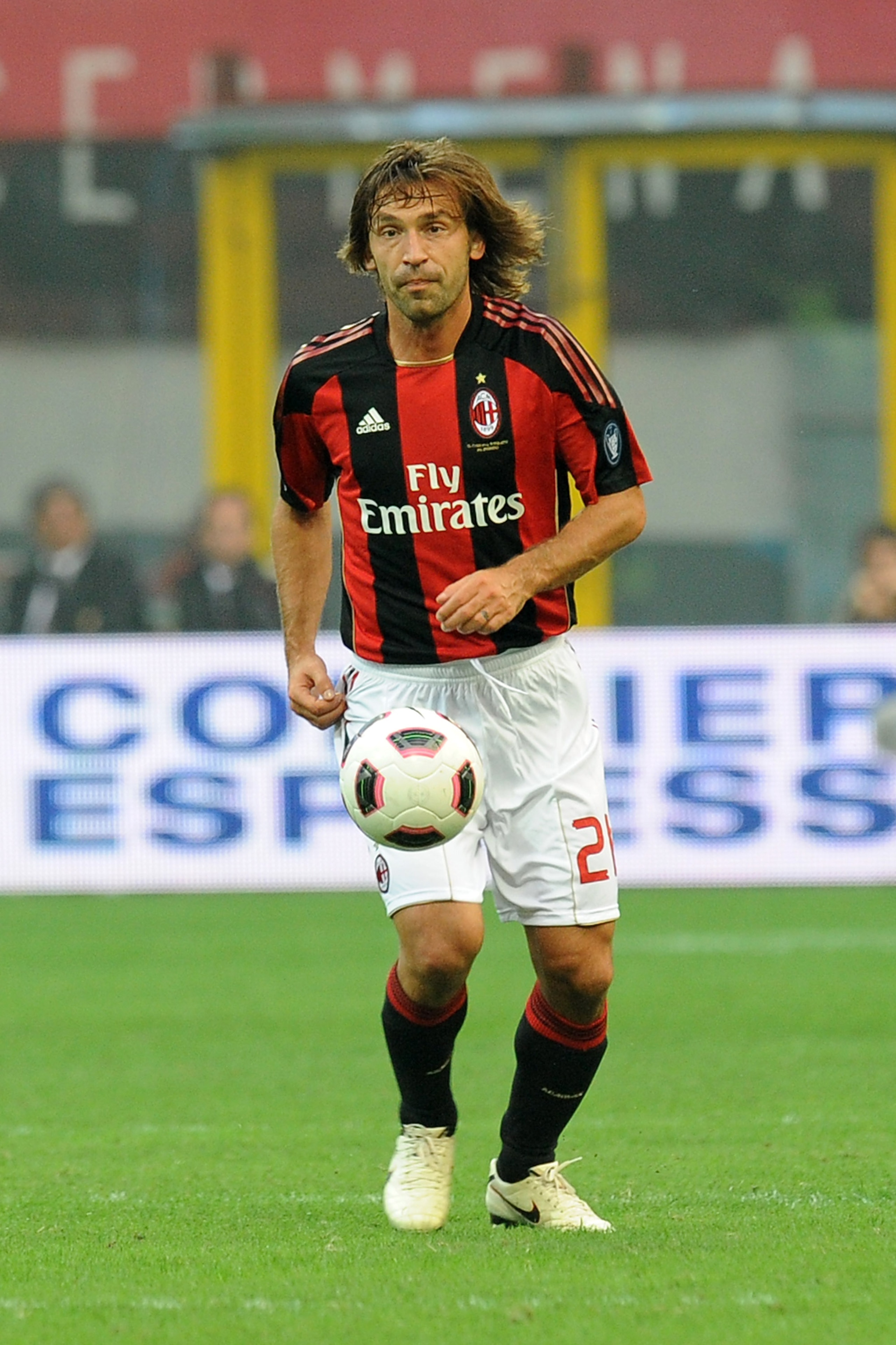 MILAN, ITALY - SEPTEMBER 26:  Andrea Pirlo of Milan in action during the Serie A match between AC Milan and Genoa CFC at Stadio Giuseppe Meazza on September 26, 2010 in Milan, Italy.  (Photo by Tullio M. Puglia/Getty Images)