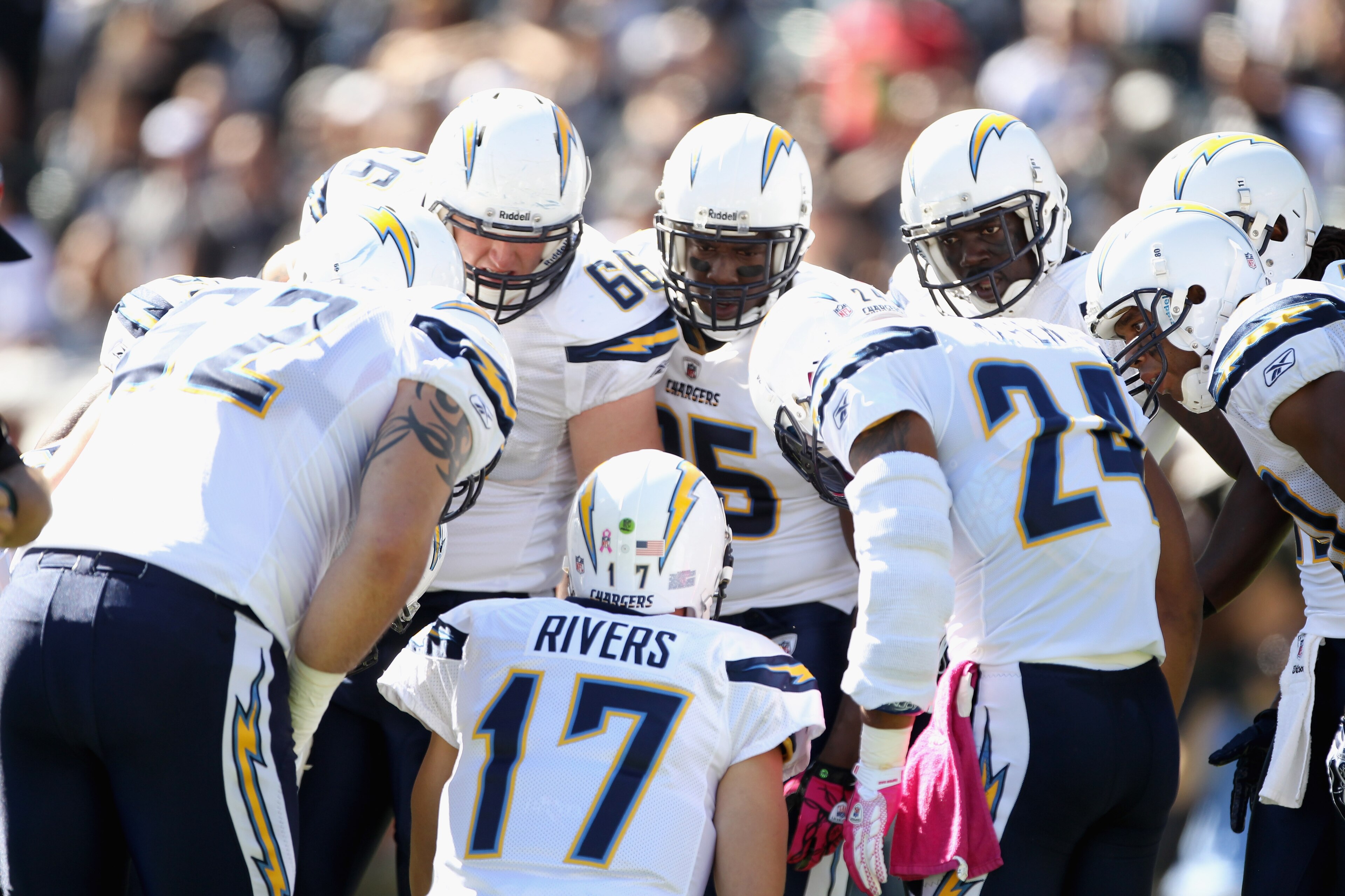 OAKLAND, CA - OCTOBER 10:  Philip Rivers #17 of the San Diego Chargers huddles his team together during their game against the Oakland Raiders at Oakland-Alameda County Coliseum on October 10, 2010 in Oakland, California.  (Photo by Ezra Shaw/Getty Images