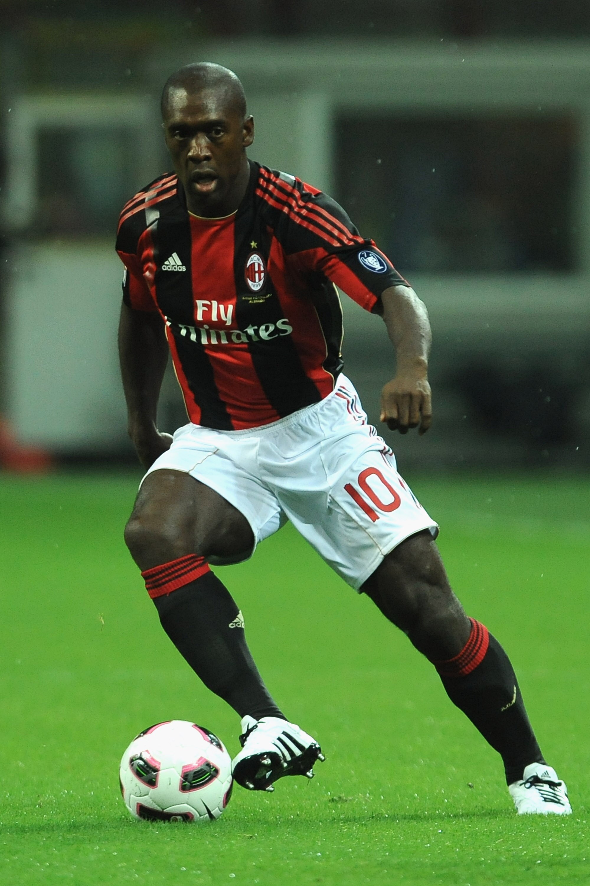 MILAN, ITALY - SEPTEMBER 18:  Clarence Seedorf of AC Milan in action during the Serie A match between AC Milan and Catania Calcio at Stadio Giuseppe Meazza on September 18, 2010 in Milan, Italy.  (Photo by Valerio Pennicino/Getty Images)