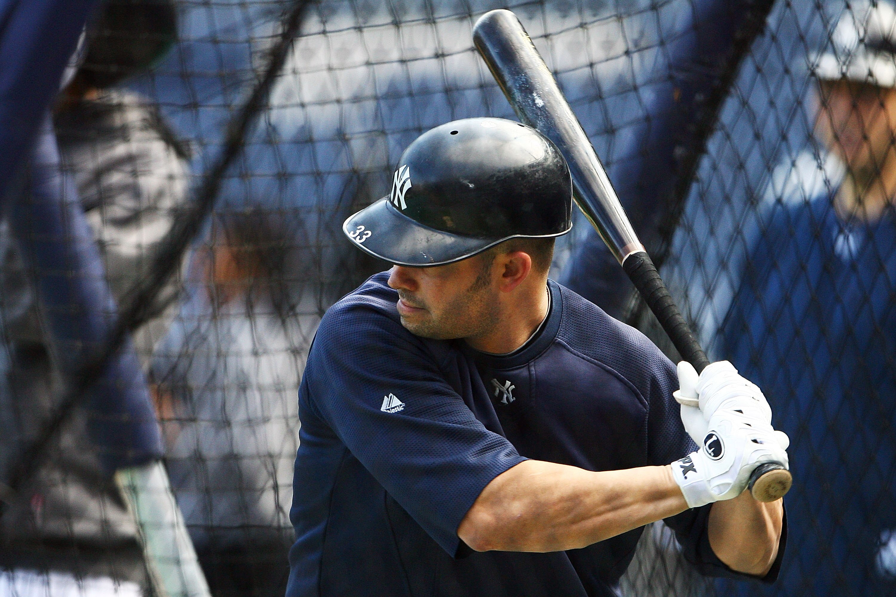 NEW YORK - OCTOBER 12:  Nick Swisher #33 of the New York Yankees practices batting during a workout session at Yankee Stadium on October 12, 2010 in the Bronx borough of New York City.  (Photo by Andrew Burton/Getty Images)