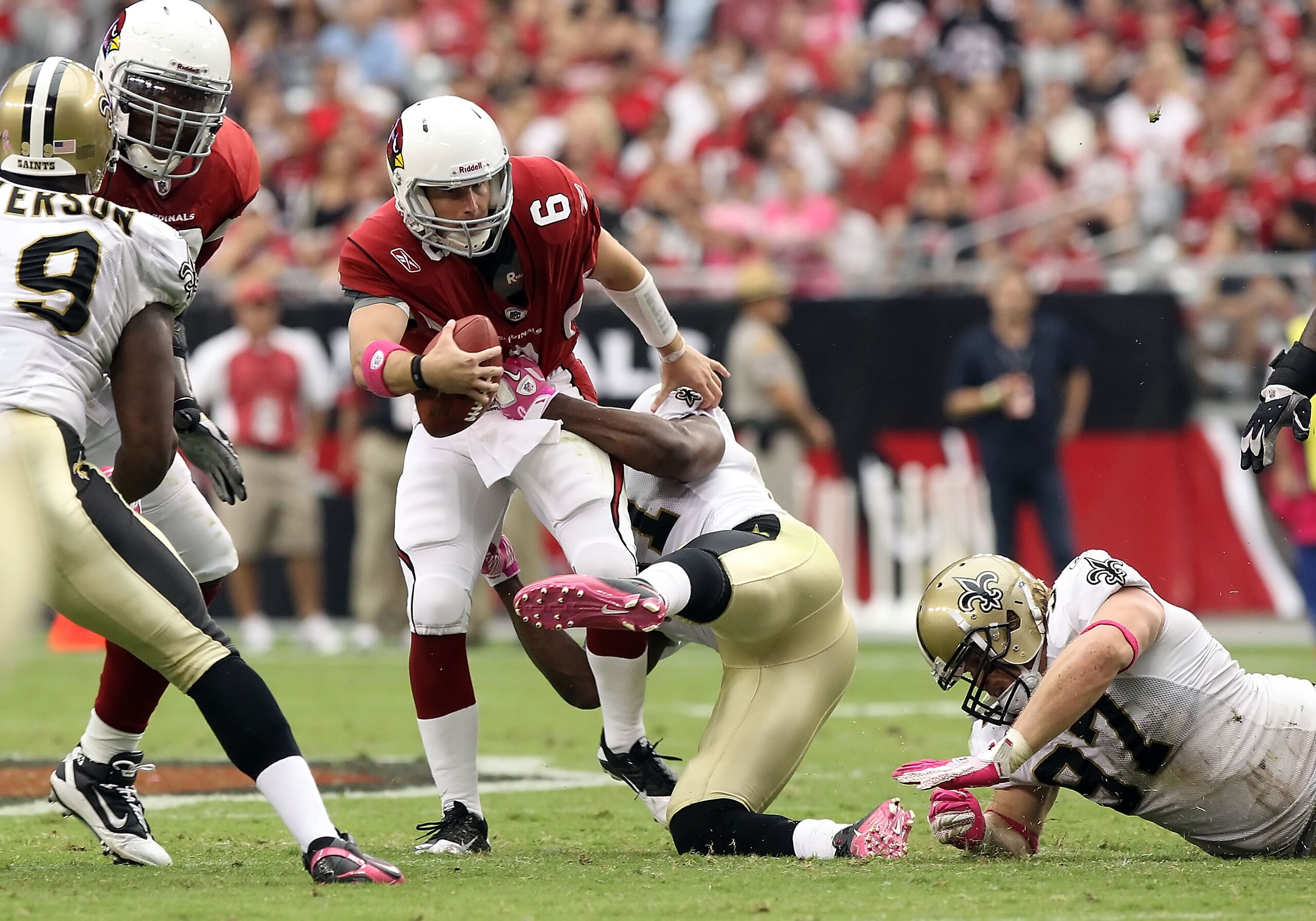GLENDALE, AZ - OCTOBER 10:  Quarterback Max Hall #6 of the Arizona Cardinals is sacked by Jonathan Vilma ##51 of the New Orleans Saints during the second quarter of the NFL game at the University of Phoenix Stadium on October 10, 2010 in Glendale, Arizona