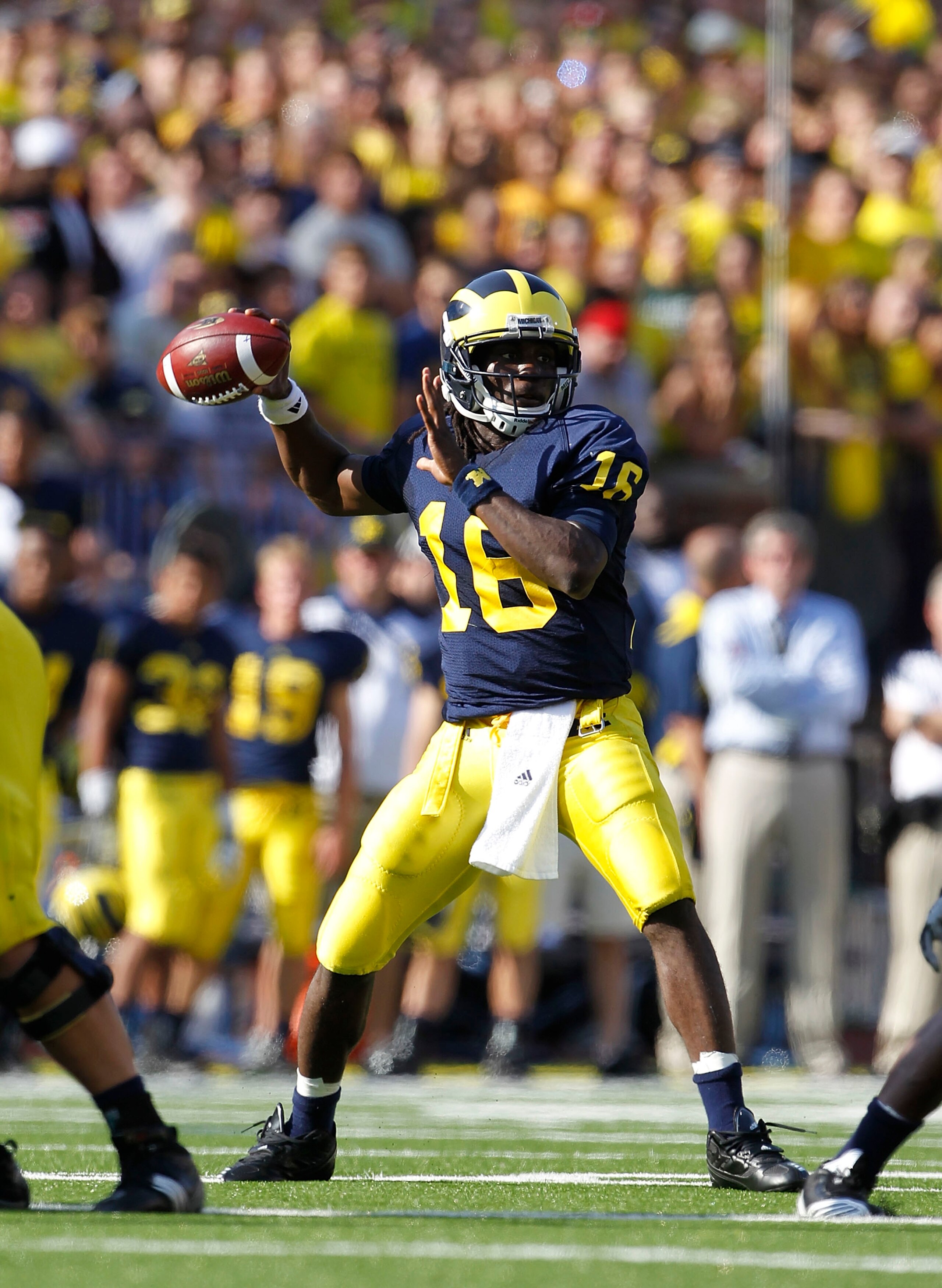 ANN ARBOR, MI - OCTOBER 09: Denard Robinson #16 of the Michigan Wolverines drops back to pass in the second quarter during the game against the Michigan State Spartans on October 9, 2010 at Michigan Stadium in Ann Arbor, Michigan. (Photo by Leon Halip/Get