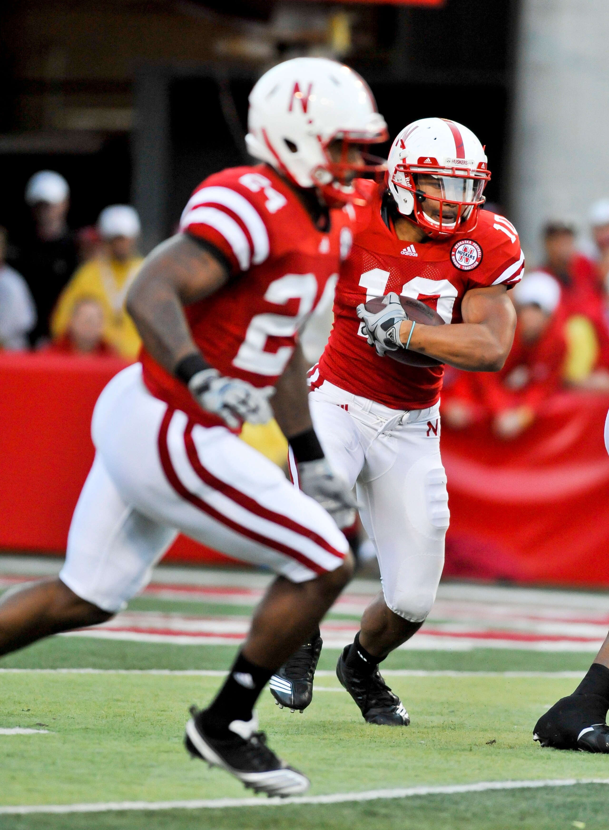 LINCOLN, NEBRASKA - SEPTEMBER 25: Nebraska Cornhuskers running back Roy Helu Jr. #10 follows wide receiver Niles Paul #24 during first half action of their game against the South Dakota State Jackrabbits at Memorial Stadium on September 25, 2010 in Lincol