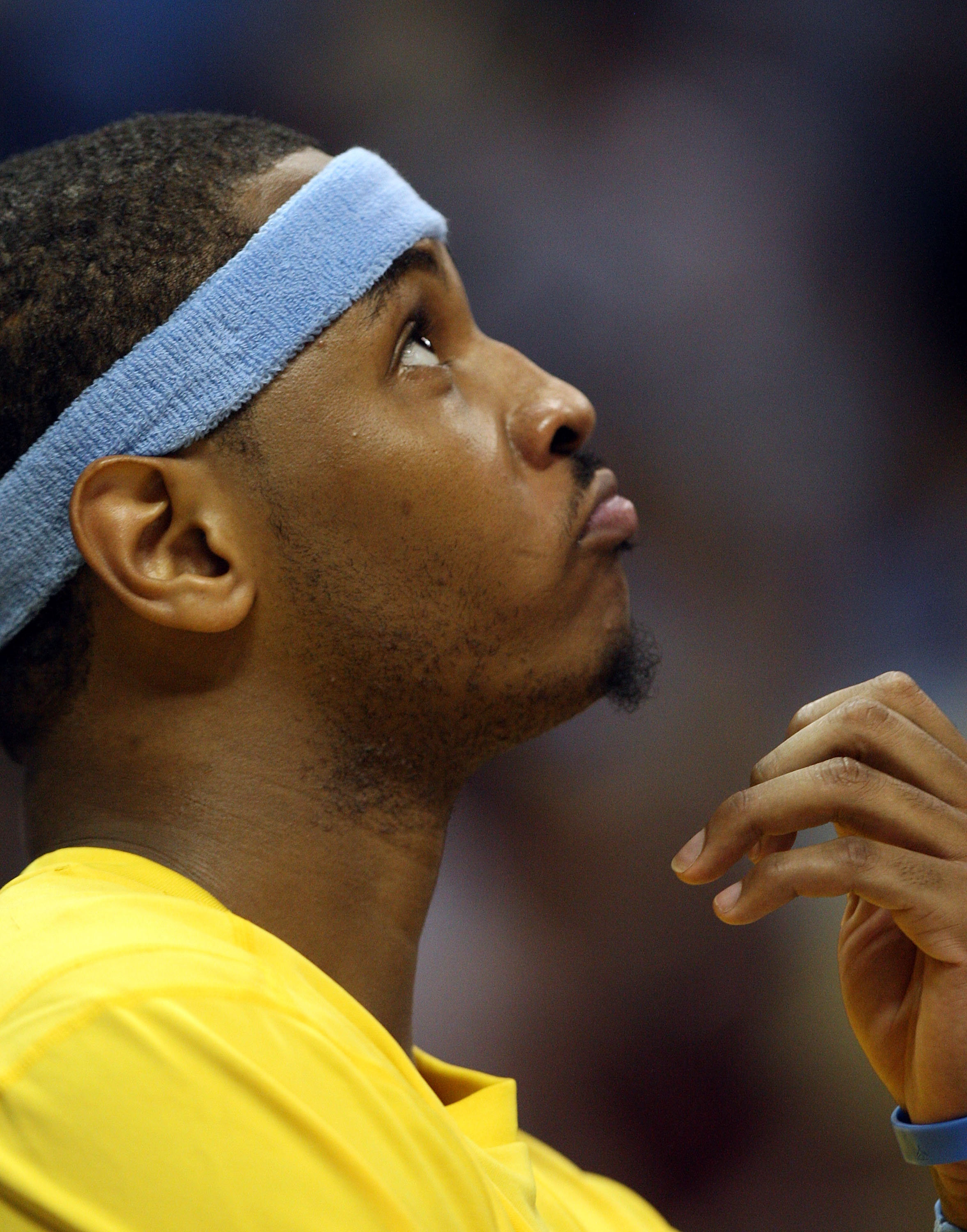 DENVER - MAY 29:  Carmelo Anthony #15 of the Denver Nuggets looks on from the bench in the fourth quarter of Game Six of the Western Conference Finals during the 2009 NBA Playoffs against the Los Angeles Lakers at Pepsi Center on May 29, 2009 in Denver, C