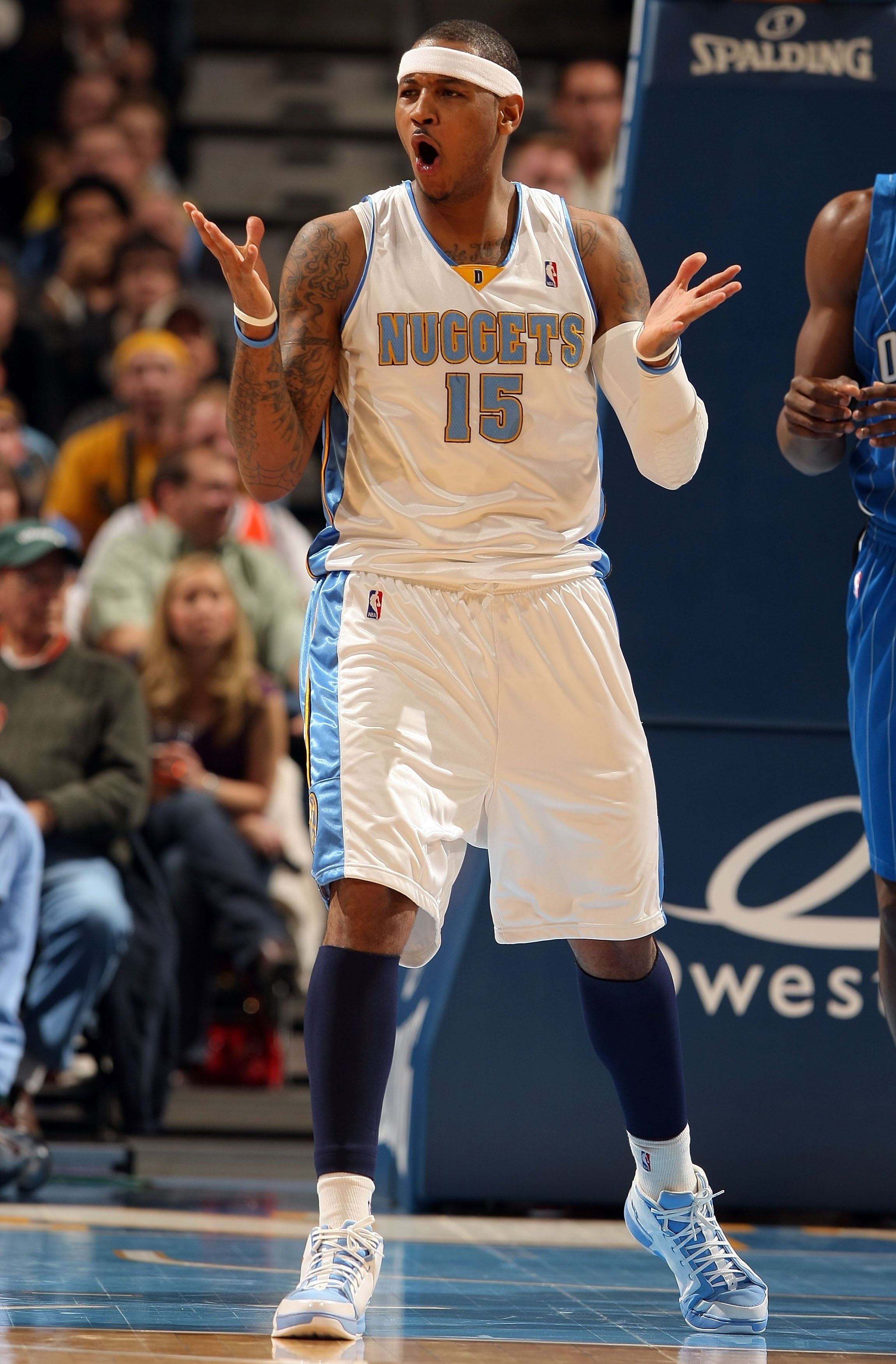 DENVER - JANUARY 13:  Carmelo Anthony #15 of the Denver Nuggets reacts after a play against the Orlando Magic during NBA action at Pepsi Center on January 13, 2010 in Denver, Colorado. The Nuggets defeated the Magic 115-97. NOTE TO USER: User expressly ac