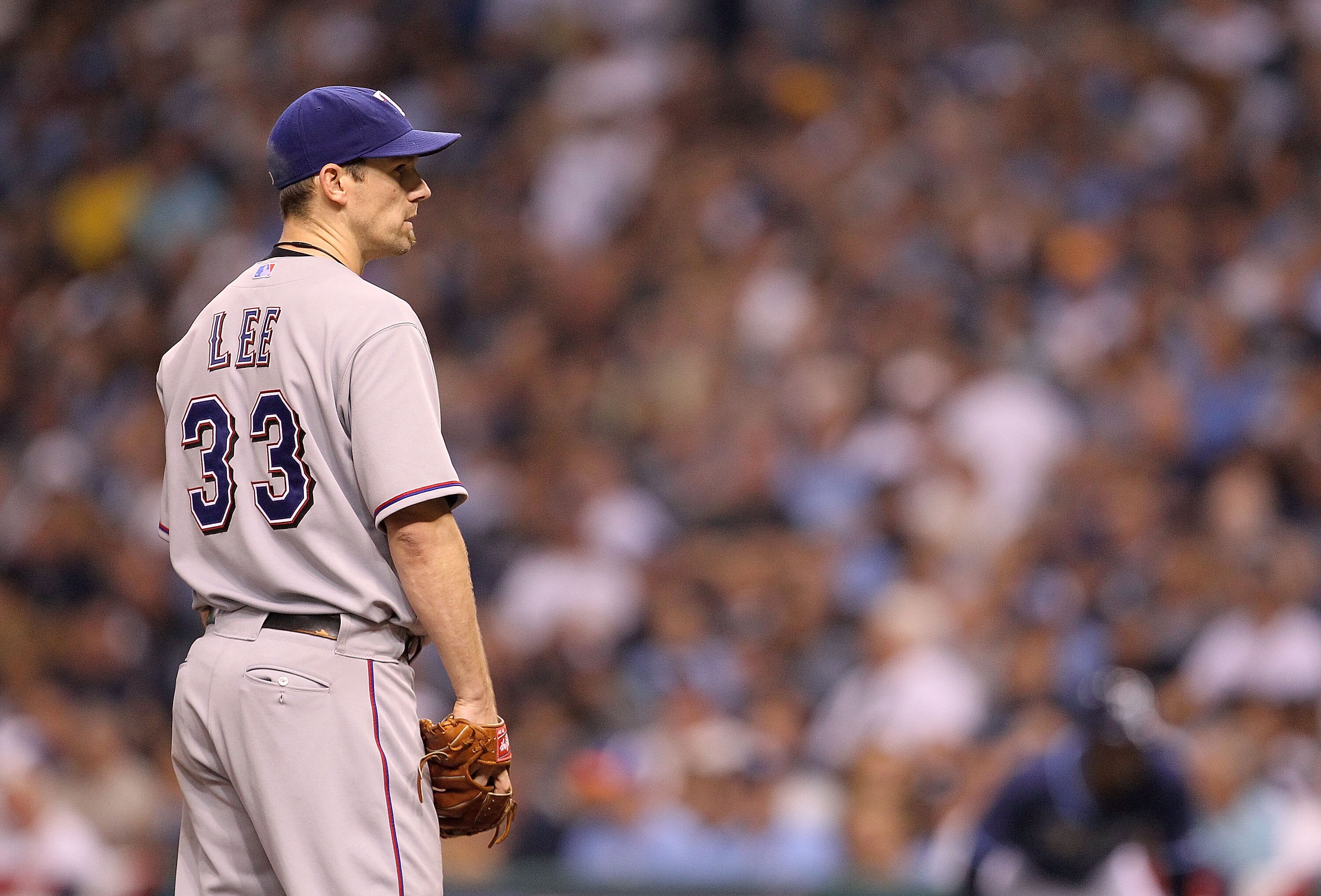 ST PETERSBURG, FL - OCTOBER 12:  Cliff Lee #33 of the Texas Rangers pitches during Game 5 of the ALDS against the Tampa Bay Rays at Tropicana Field on October 12, 2010 in St. Petersburg, Florida.  (Photo by Mike Ehrmann/Getty Images)