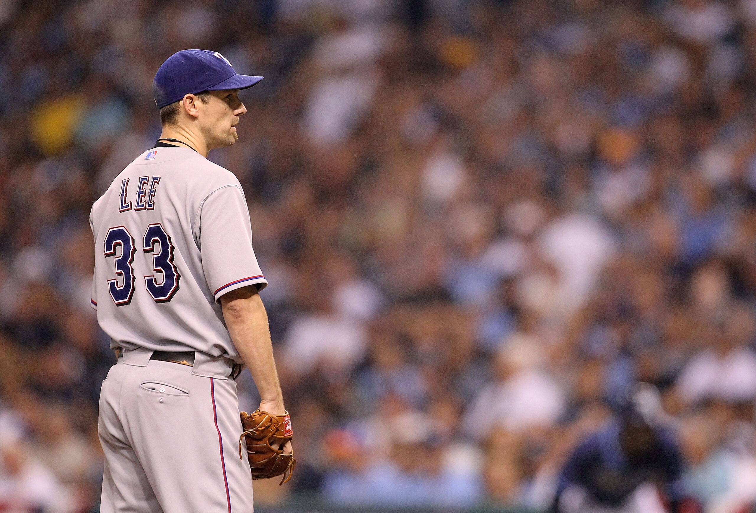 ST PETERSBURG, FL - OCTOBER 12:  Cliff Lee #33 of the Texas Rangers pitches during Game 5 of the ALDS against the Tampa Bay Rays at Tropicana Field on October 12, 2010 in St. Petersburg, Florida.  (Photo by Mike Ehrmann/Getty Images)