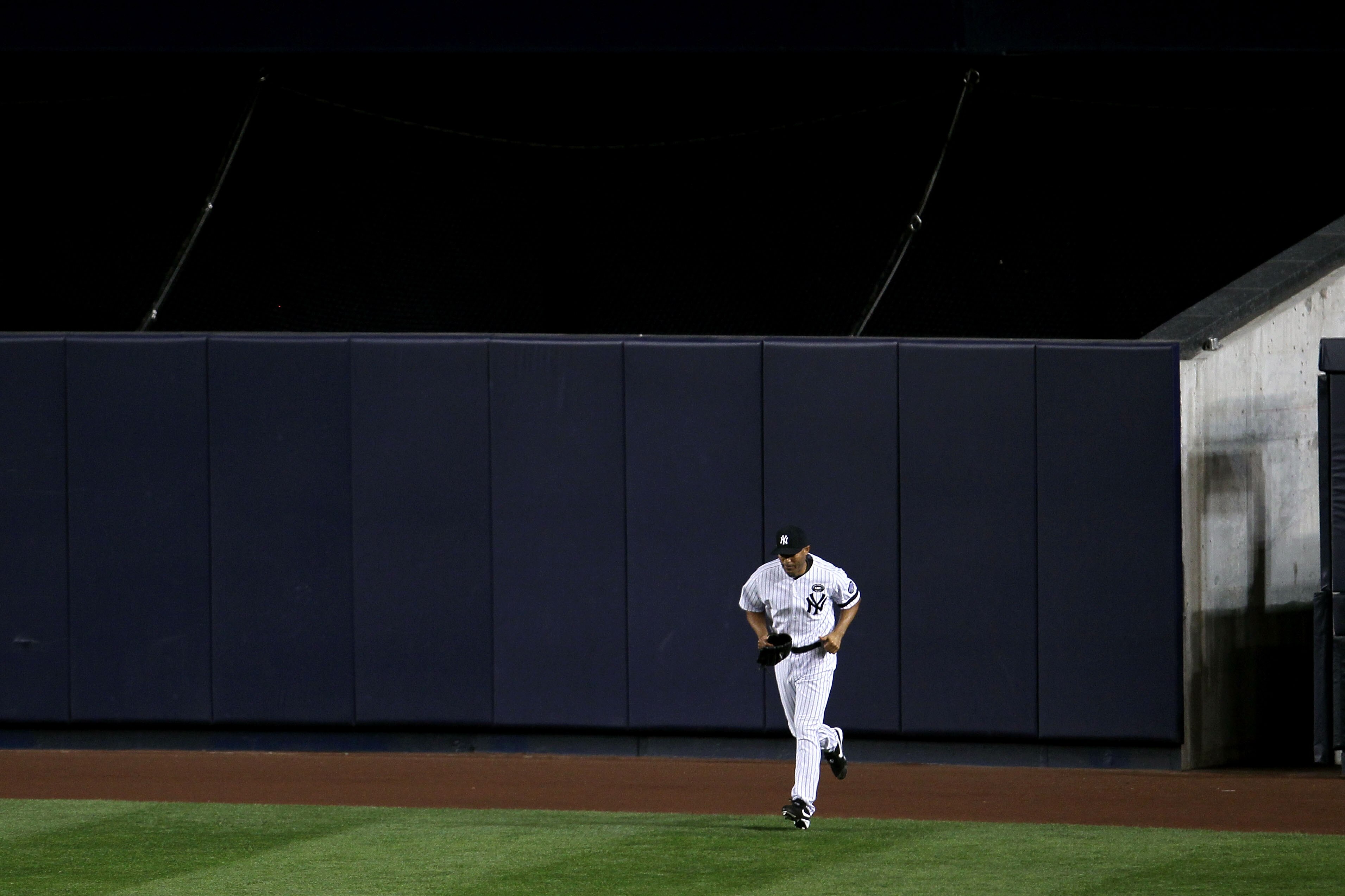 NEW YORK - OCTOBER 09:  Mariano Rivera #42 of the New York Yankees runs out of the bullpen onto the field to pitch against the Minnesota Twins during Game Three of the ALDS part of the 2010 MLB Playoffs at Yankee Stadium on October 9, 2010 in the Bronx bo
