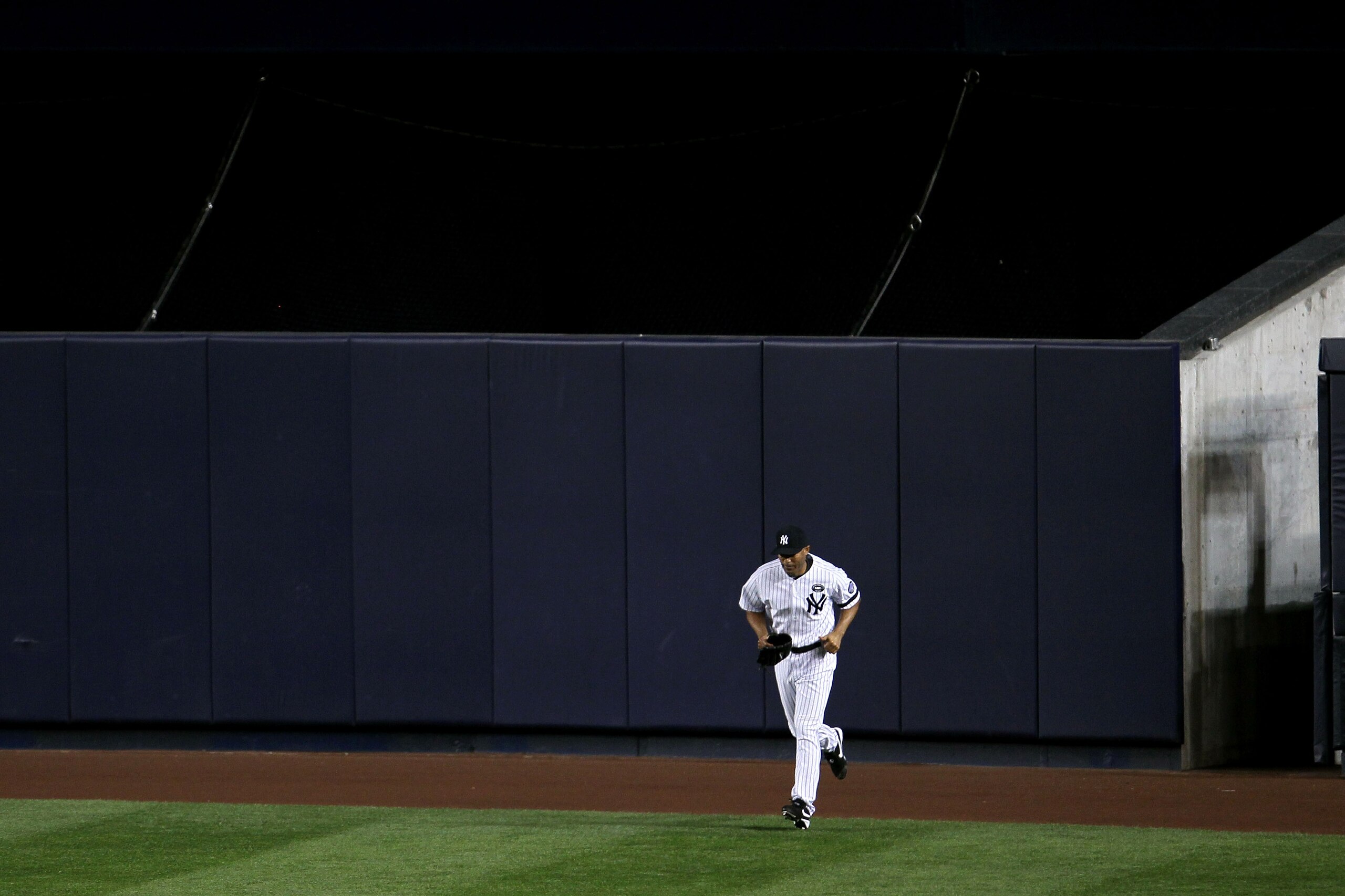 NEW YORK - OCTOBER 09:  Mariano Rivera #42 of the New York Yankees runs out of the bullpen onto the field to pitch against the Minnesota Twins during Game Three of the ALDS part of the 2010 MLB Playoffs at Yankee Stadium on October 9, 2010 in the Bronx bo