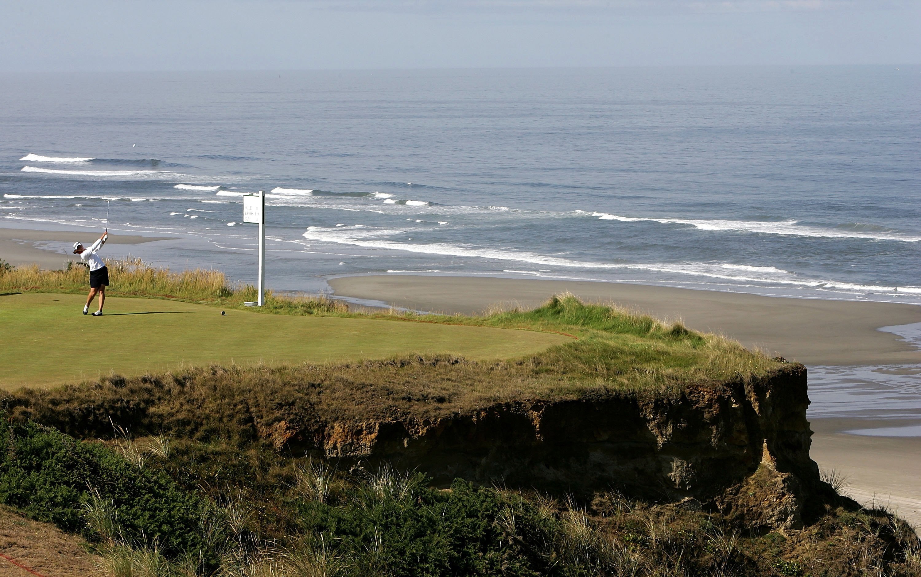 BANDON, OR - JULY 30:  Paige Mackenzie of the United States tees off on the 11th hole during the morning foursome competition of the 34th Curtis Cup Match on July 30, 2006 at Pacific Dunes part of Bandon Dunes Golf Resort in Bandon, Oregon.  (Photo by Jon