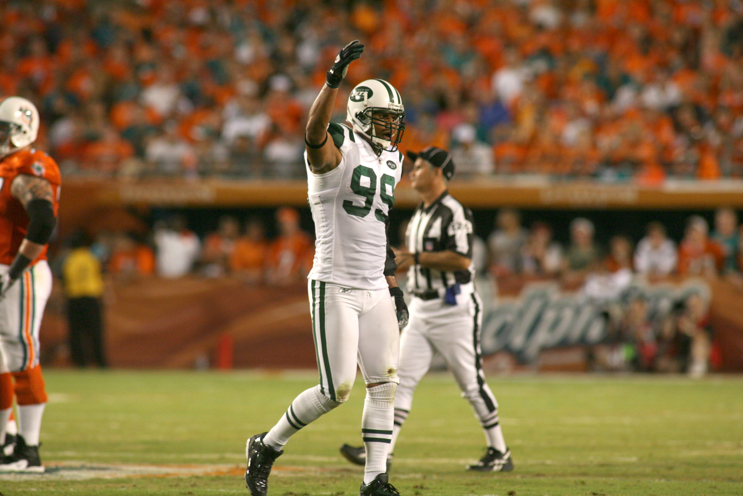 MIAMI - SEPTEMBER 26: Defensive end Jason Taylor #99 of the New York Jets sackS against Chad Henne #7 of the Miami Dolphins at Sun Life Stadium on September 26, 2010 in Miami, Florida. The Jets won 31-23. (Photo by Marc Serota/Getty Images)