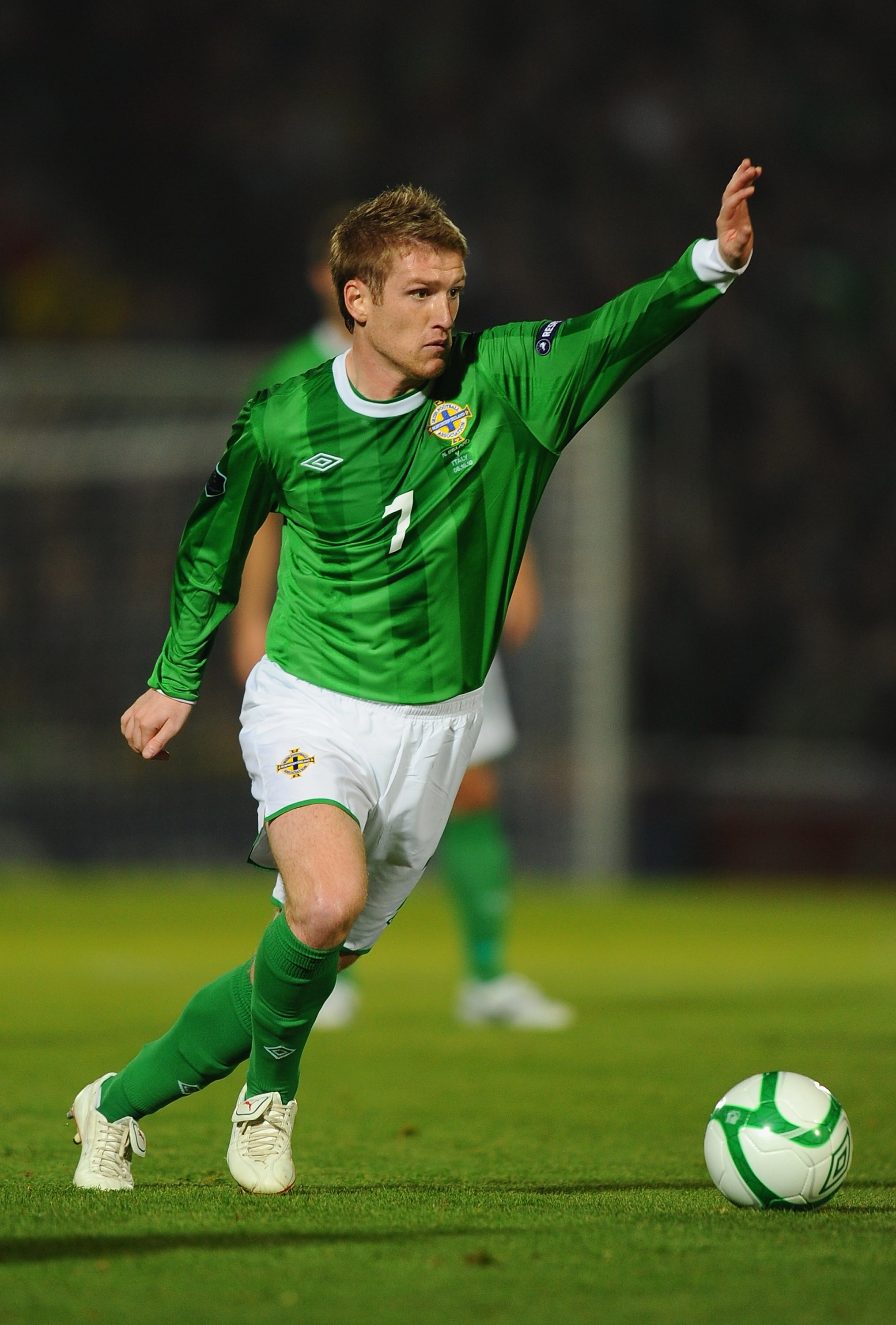 BELFAST, NORTHERN IRELAND - OCTOBER 08:   Steven Davis of Northern Ireland in action during the EURO 2012 Qualifier Group C match between Northern Ireland and Italy at Windsor Park on October 8, 2010 in Belfast, Northern Ireland.  (Photo by Mike Hewitt/Ge