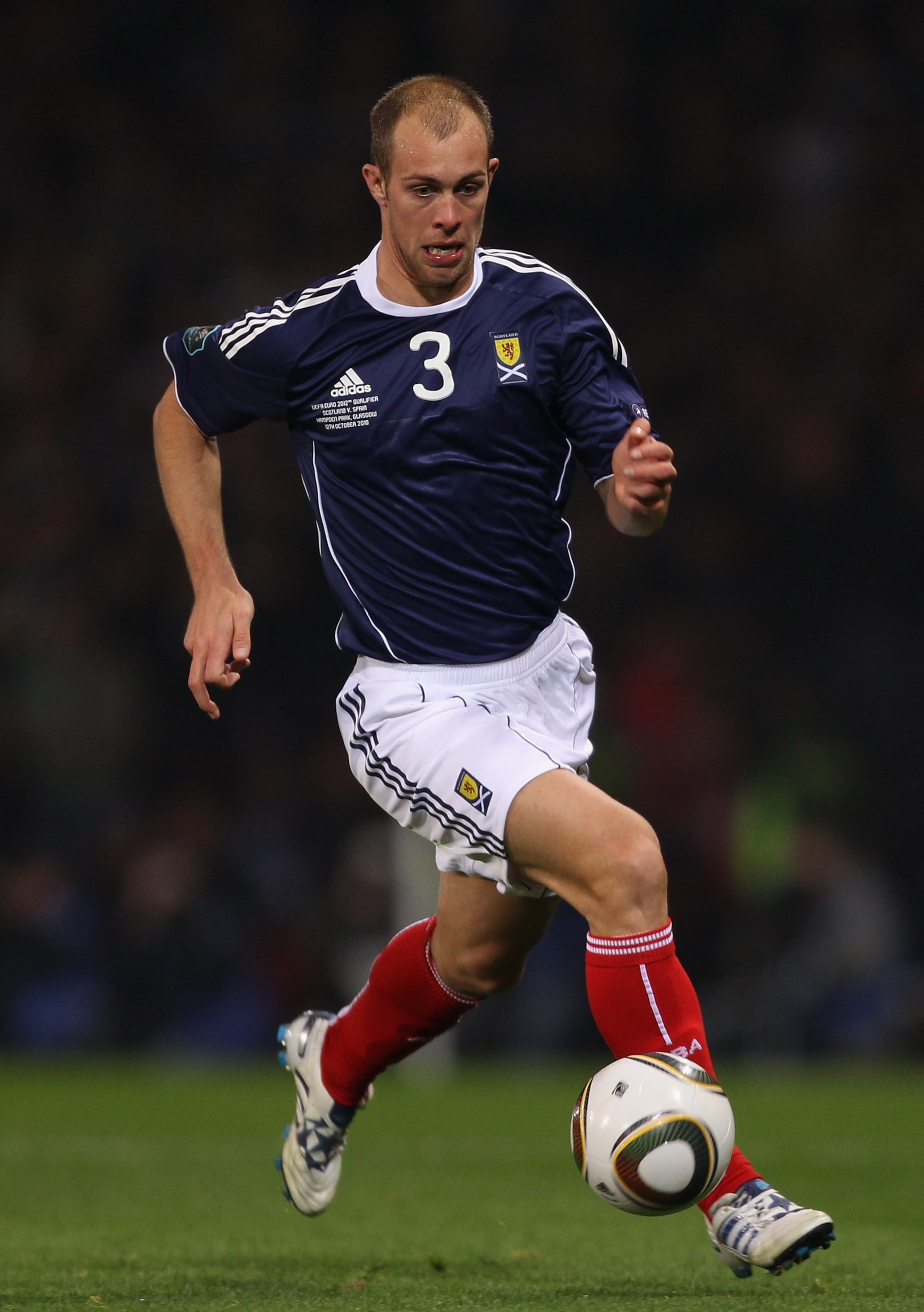 GLASGOW, SCOTLAND - OCTOBER 12:  Steven Whittaker of Scotland runs with the ball during the UEFA EURO 2012 Group I Qualifier match between Scotland and Spain at Hampden Park on October 12, 2010 in Glasgow, Scotland.  (Photo by Alex Livesey/Getty Images)