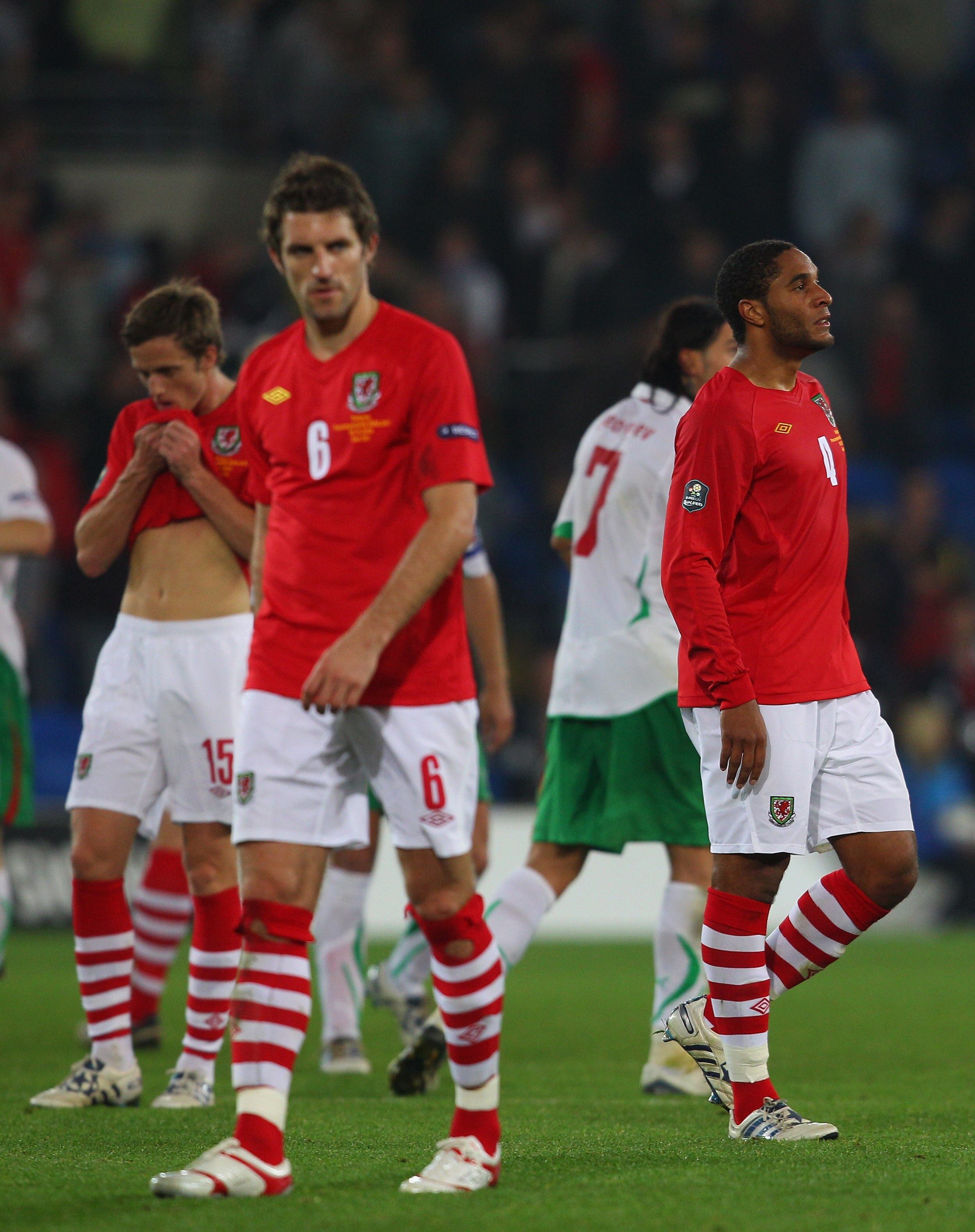 CARDIFF, WALES - OCTOBER 08:  Wales captain Ashley Williams (r) and Sam Ricketts look on dejectedly at the end of the EURO 2012  Group G Qualifier between Wales and Bulgaria at Cardiff City Stadium on October 8, 2010 in Cardiff, Wales.  (Photo by Stu Fors