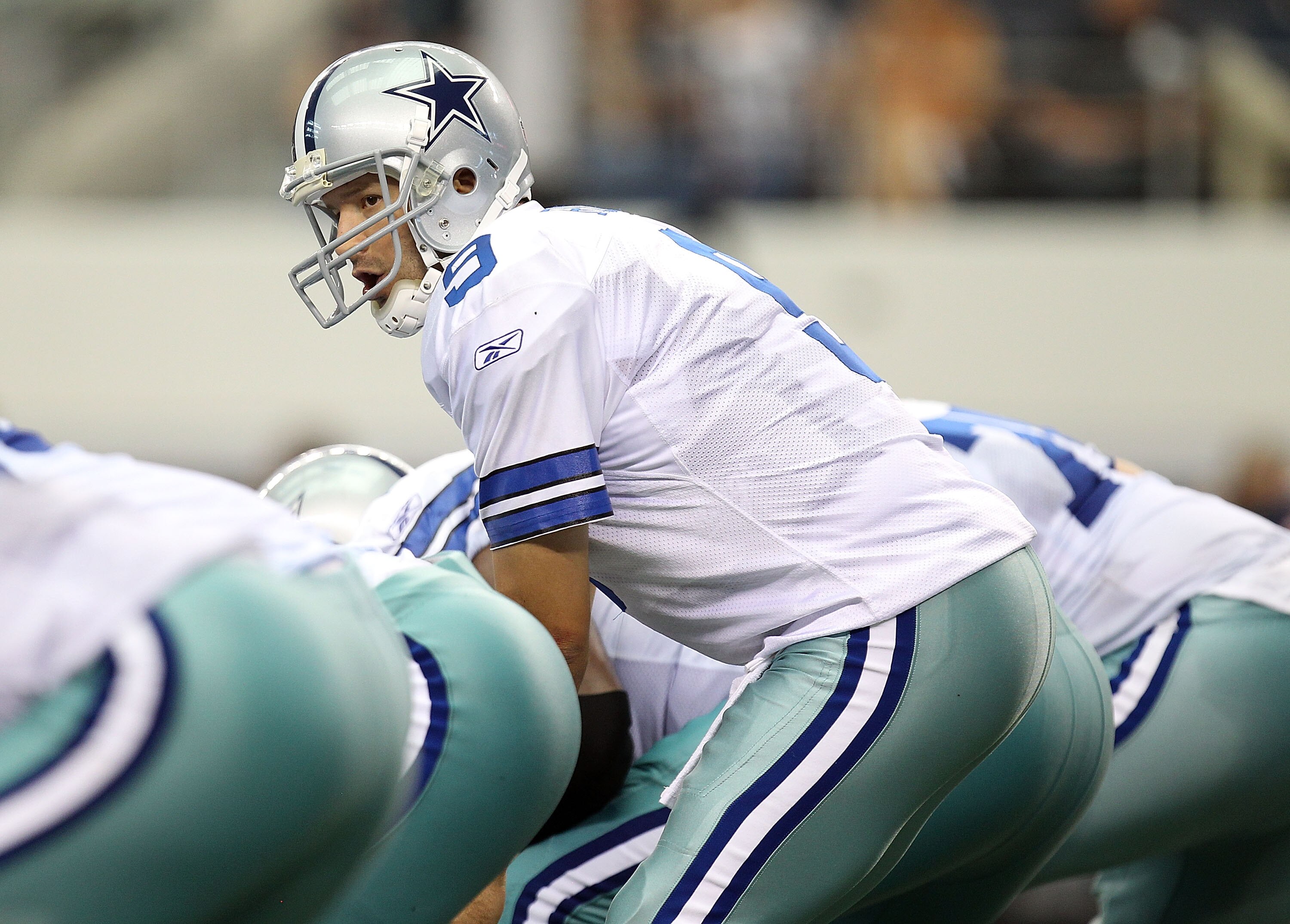ARLINGTON, TX - SEPTEMBER 19: Quarterback Tony Romo #9 of the Dallas Cowboys at Cowboys Stadium on September 19, 2010 in Arlington, Texas. (Photo by Ronald Martinez/Getty Images) ARLINGTON, TX - SEPTEMBER 19: Quarterback Tony Romo #9 of the Dallas Cowboys at Cowboys Stadium on September 19, 2010 in Arlington, Texas. (Photo by Ronald Martinez/Getty Images)