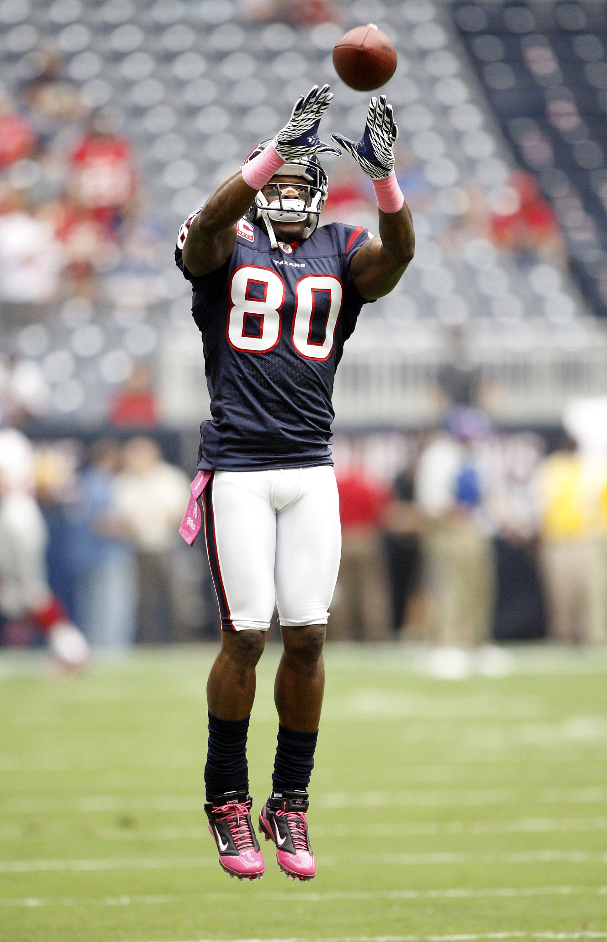 HOUSTON - OCTOBER 10: Wide receiver Andre Johnson #80 of the Houston Texans warms up prior to playing the New York Giants at Reliant Stadium on October 10, 2010 in Houston, Texas. Johnson was a game day decision as to whether he would play after suffer HOUSTON - OCTOBER 10: Wide receiver Andre Johnson #80 of the Houston Texans warms up prior to playing the New York Giants at Reliant Stadium on October 10, 2010 in Houston, Texas. Johnson was a game day decision as to whether he would play after suffer