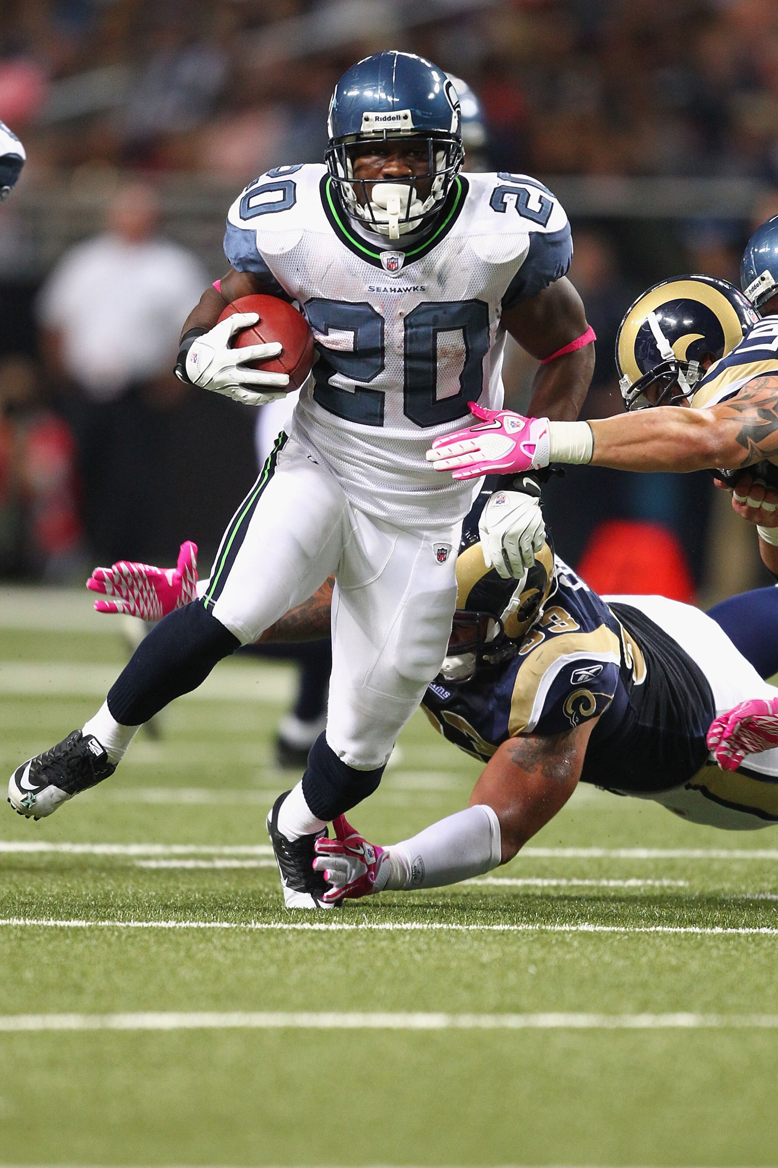 ST. LOUIS - OCTOBER 3: Justin Forsett #20 of the Seattle Seahawks rushes against the St. Louis Rams at the Edward Jones Dome on October 3, 2010 in St. Louis, Missouri.  The Rams beat the Seahawks 20-3.  (Photo by Dilip Vishwanat/Getty Images)