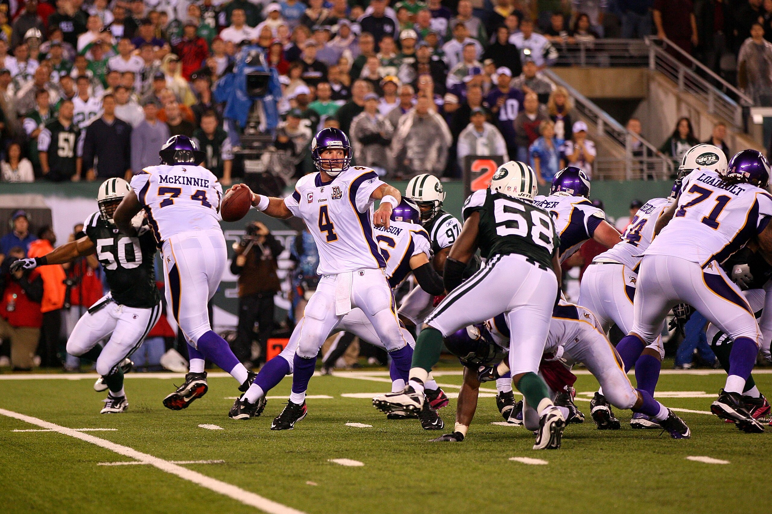 EAST RUTHERFORD, NJ - OCTOBER 11:  Brett Favre #4 of the Minnesota Vikings looks to pass against the New York Jets at New Meadowlands Stadium on October 11, 2010 in East Rutherford, New Jersey.  (Photo by Andrew Burton/Getty Images)