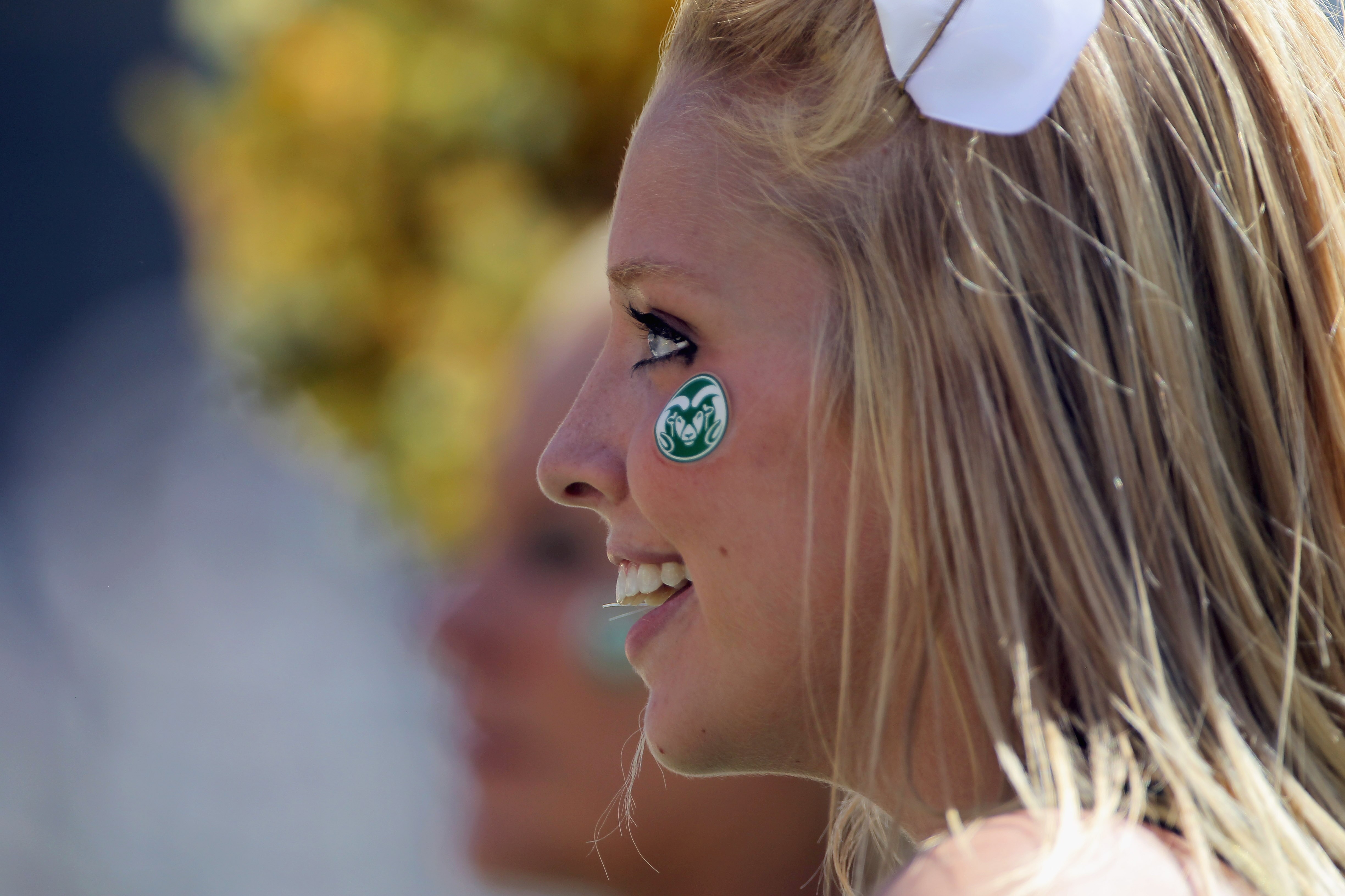 DENVER - SEPTEMBER 04:  The Colorado State Rams cheerleaders support their team as the Rams face the Colorado Buffaloes during the the Rocky Mountain Showdown at INVESCO Field at Mile High on September 4, 2010 in Denver, Colorado.  (Photo by Doug Pensinge