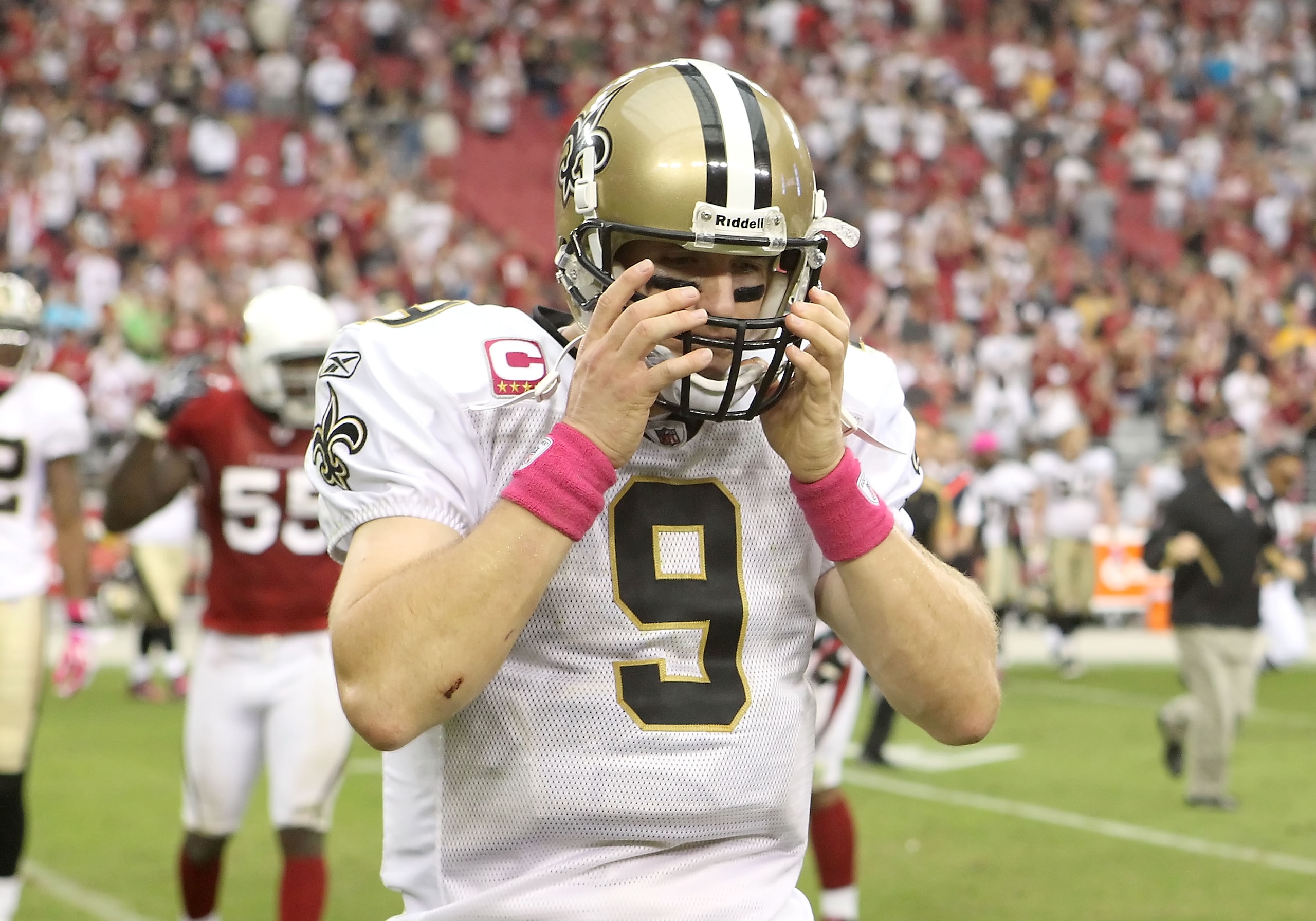 GLENDALE, AZ - OCTOBER 10:  Quarterback Drew Brees #9 of the New Orleans Saints reacts as he walks off the field after being defeated by the Arizona Cardinals in the NFL game at the University of Phoenix Stadium on October 10, 2010 in Glendale, Arizona. T