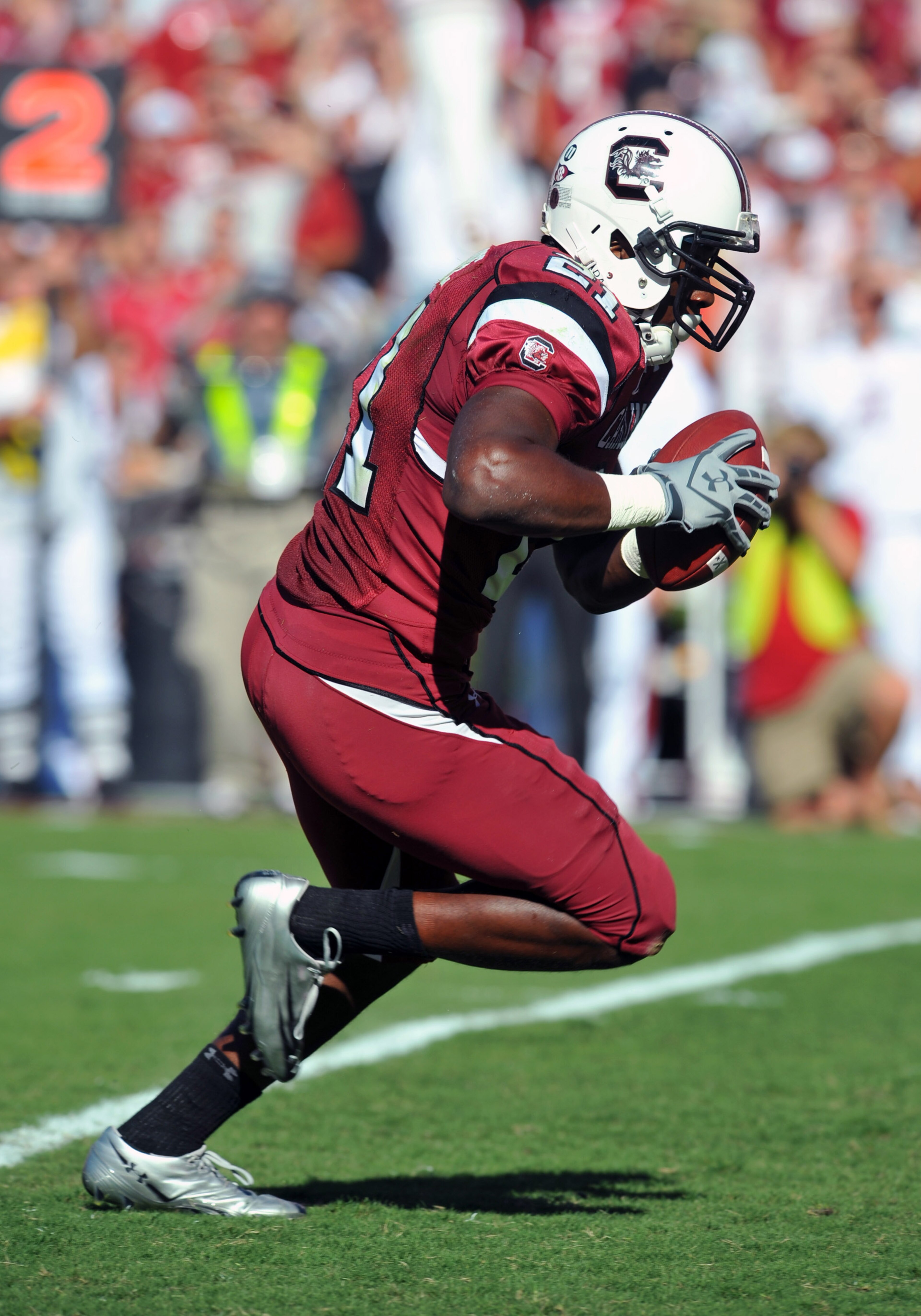 COLUMBIA, SC - OCTOBER 9: Running back Marcus Lattimore #21 of the South Carolina Gamecocks runs for a touchdown against the Alabama Crimson Tide October 9, 2010 at Williams-Brice Stadium in Columbia, South Carolina. (Photo by Al Messerschmidt/Getty Imag COLUMBIA, SC - OCTOBER 9: Running back Marcus Lattimore #21 of the South Carolina Gamecocks runs for a touchdown against the Alabama Crimson Tide October 9, 2010 at Williams-Brice Stadium in Columbia, South Carolina. (Photo by Al Messerschmidt/Getty Imag