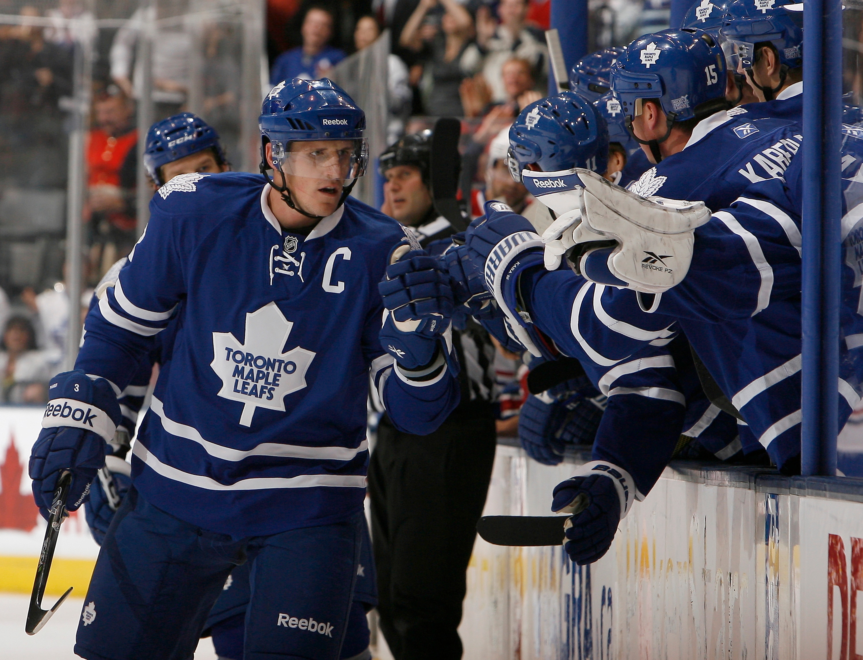 TORONTO - OCTOBER 7:Dion Phaneuf #3 of the Toronto Maple Leafs celebrates goal during a regular season NHL game against the Montreal Canadiens at the Air Canada Centre October 7, 2010 in Toronto, Ontario, Canada. (Photo by Abelimages/Getty Images)