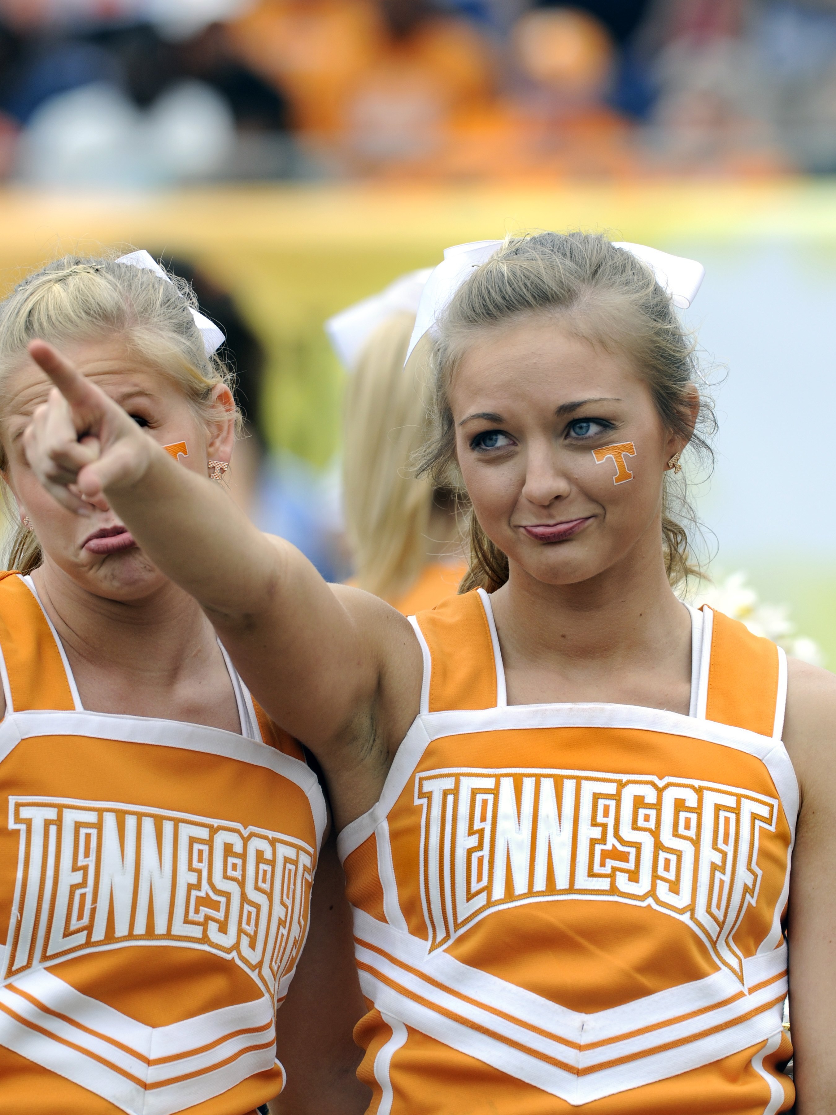 TAMPA, FL -  JANUARY 1: A cheerleader of the Tennessee Volunteers cehck the scoreboard against the Wisconsin Badgers in the 2008 Outback Bowl at Raymond James Stadium on January 1, 2008 in Tampa, Florida.   The Volunteers won 21 - 17. (Photo by Al Messers