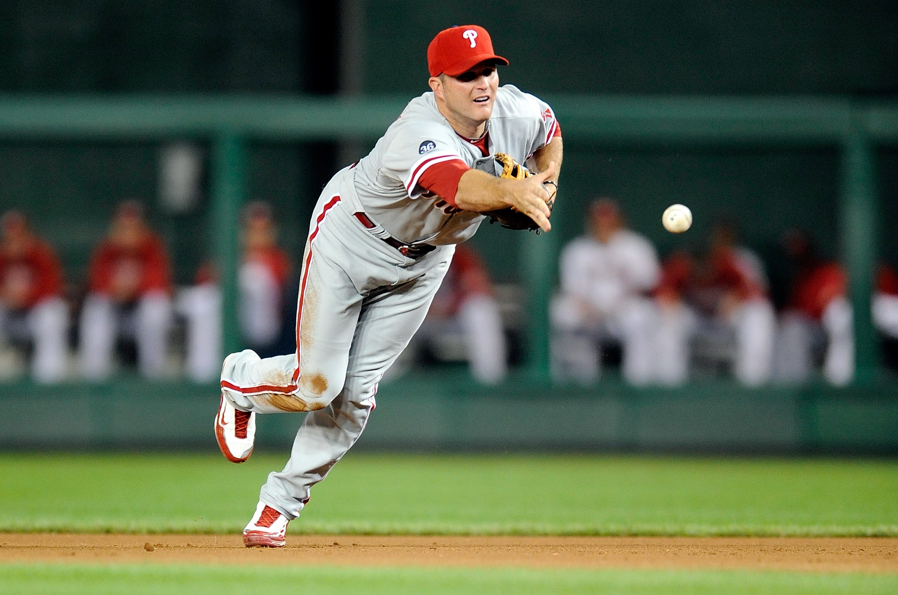 WASHINGTON - SEPTEMBER 29:  Mike Sweeney #5 of the Philadelphia Phillies tosses the ball to first base during the game against the Washington Nationals at Nationals Park on September 29, 2010 in Washington, DC.  (Photo by Greg Fiume/Getty Images)
