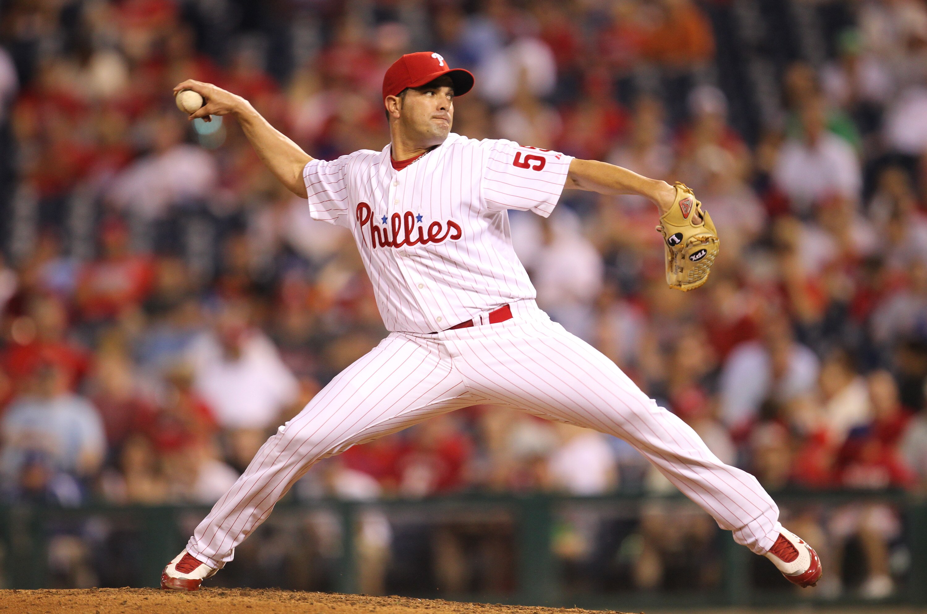 PHILADELPHIA - MAY 2: Relief pitcher Danys Baez #55 of the Philadelphia Phillies delivers a pitch during a game against the New York Mets at Citizens Bank Park on May 2, 2010 in Philadelphia, Pennsylvania. The Phillies won 11-5. (Photo by Hunter Martin/Ge