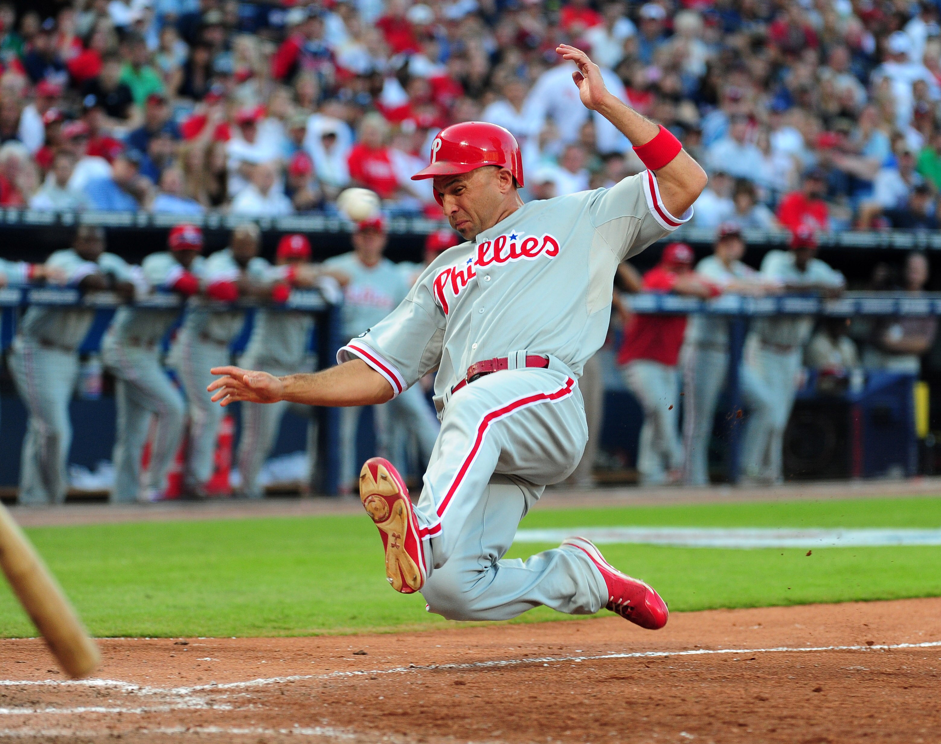 ATLANTA - OCTOBER 2: Raul Ibanez #29 of the Philadelphia Phillies scores on a wild pitch against the Atlanta Braves at Turner Field on October 2, 2010 in Atlanta, Georgia.  (Photo by Scott Cunningham/Getty Images)