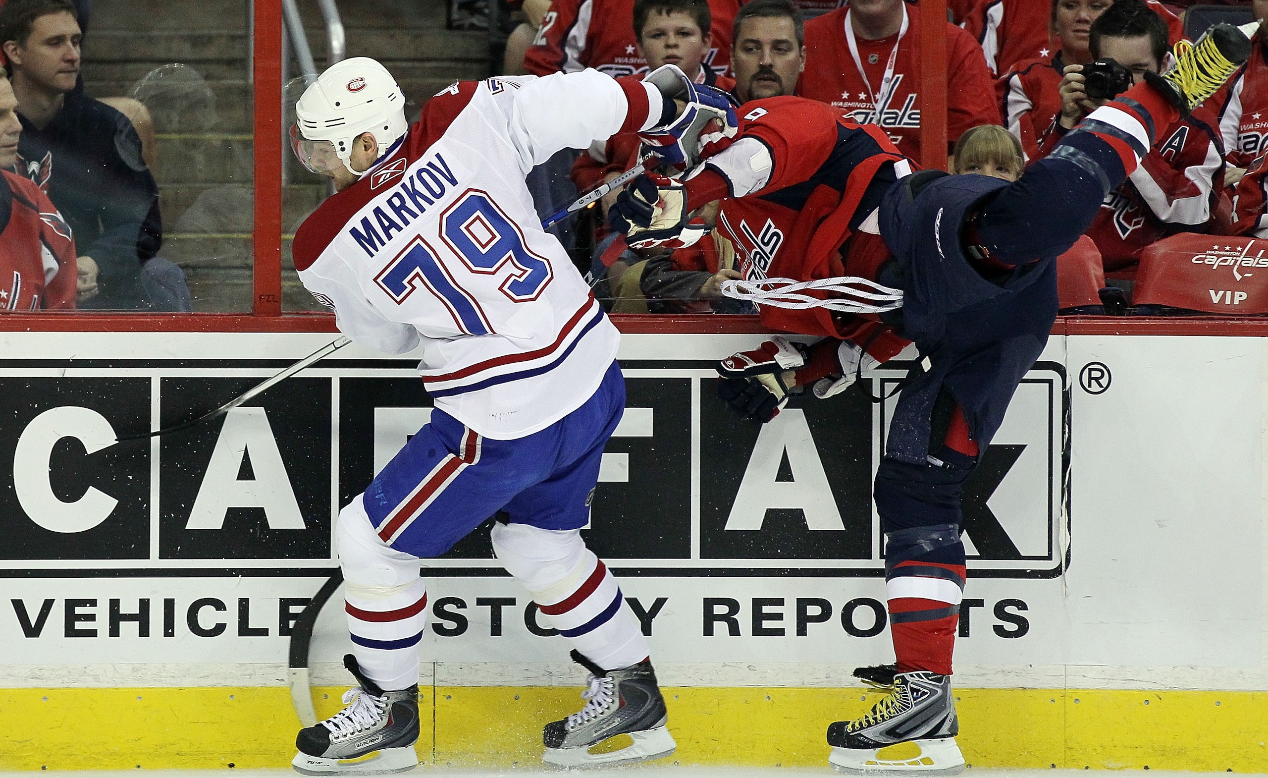 WASHINGTON DC, DC - APRIL 23: Andrei Markov #79 of the Montreal Canadiens avoids a hit from Alex Ovechkin #8 of the Washington Capitals in Game Five of the Eastern Conference Quarterfinals during the 2010 NHL Stanley Cup Playoffs at the Verizon Center on WASHINGTON DC, DC - APRIL 23: Andrei Markov #79 of the Montreal Canadiens avoids a hit from Alex Ovechkin #8 of the Washington Capitals in Game Five of the Eastern Conference Quarterfinals during the 2010 NHL Stanley Cup Playoffs at the Verizon Center on