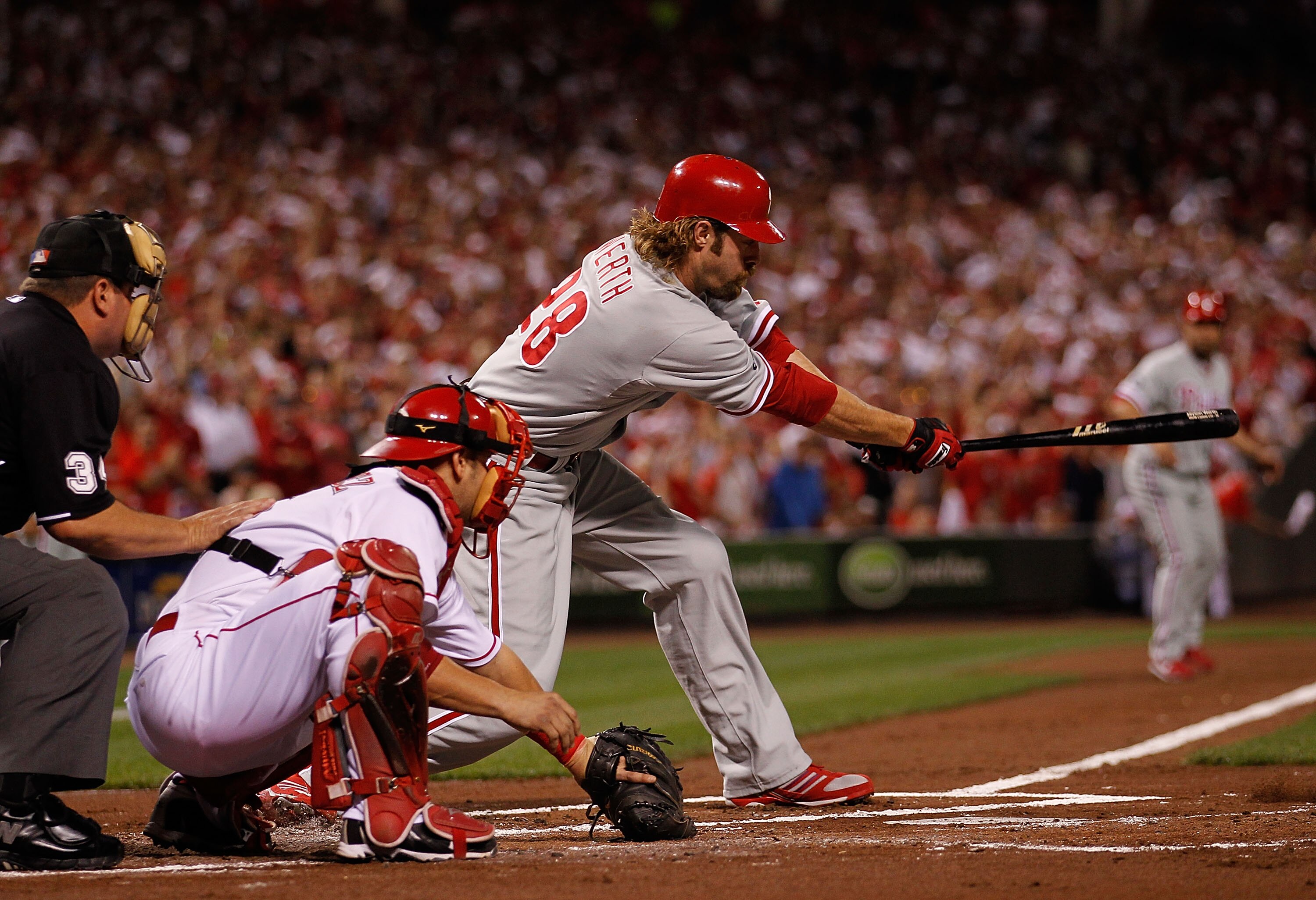CINCINNATI - OCTOBER 10: Jayson Werth #28 of the Philadelphia Phillies hits a run-scoring single in the 1st inning against the Cincinnati Reds during game 3 of the NLDS at Great American Ball Park on October 10, 2010 in Cincinnati, Ohio. (Photo by Jonatha