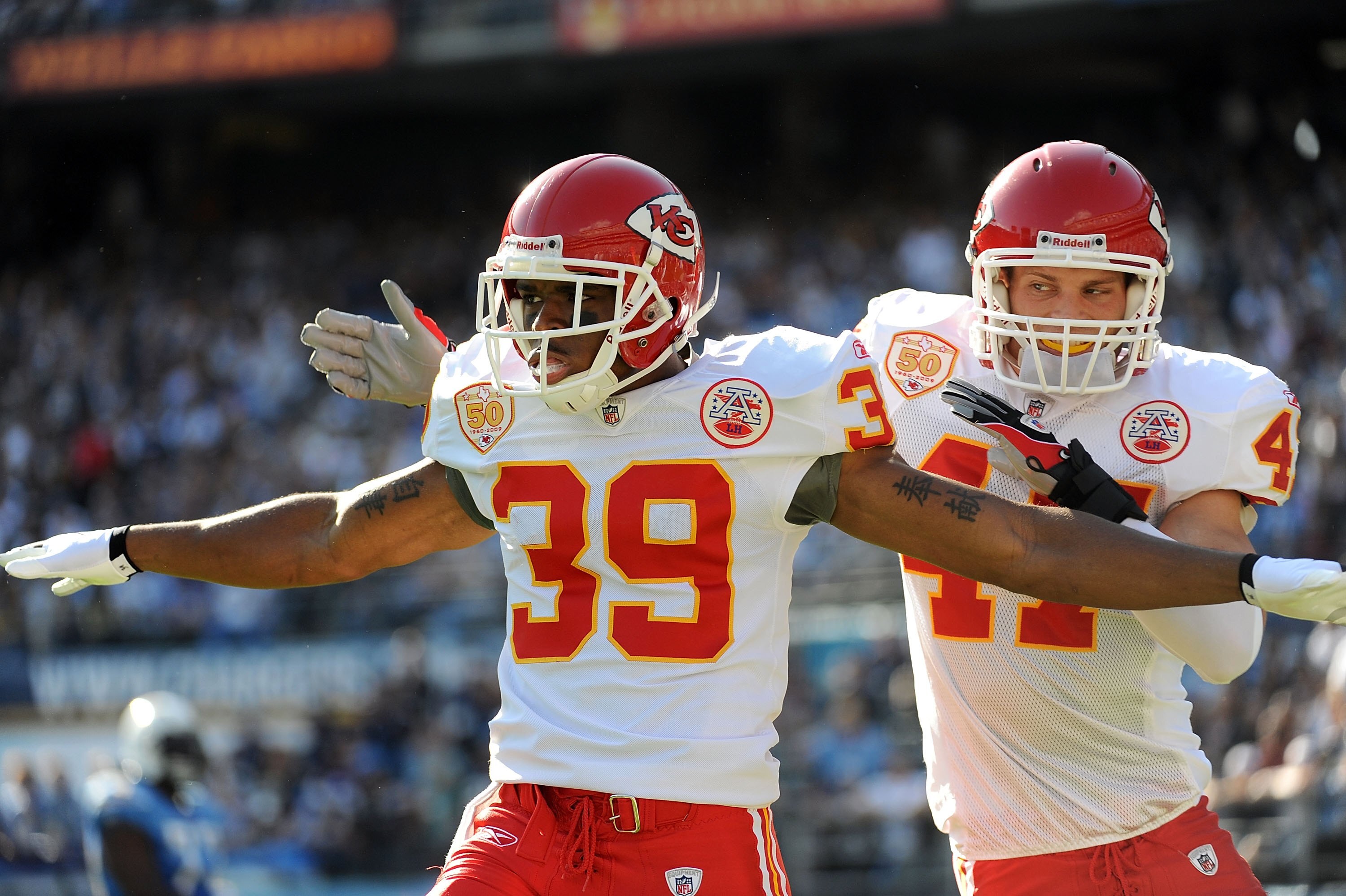 SAN DIEGO - NOVEMBER 29:  Brandon Carr #39 of the Kansas City Chiefs celebrates a third down stop with Jon McGraw #47 against San Diego Chargers at Qualcomm Stadium on November 29, 2009 in San Diego, California.  (Photo by Harry How/Getty Images)