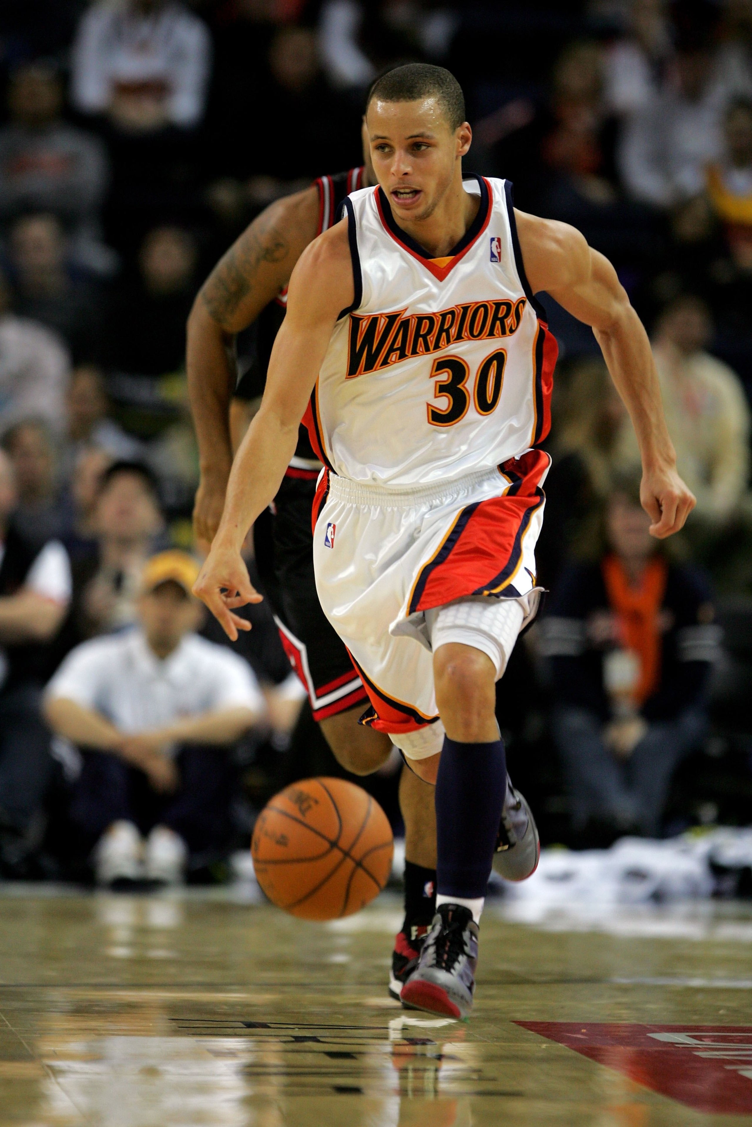 OAKLAND, CA - JANUARY 18:  Stephen Curry #30 of the Golden State Warriors in action during their game against the Chicago Bulls at Oracle Arena on January 18, 2010 in Oakland, California.  NOTE TO USER: User expressly acknowledges and agrees that, by down