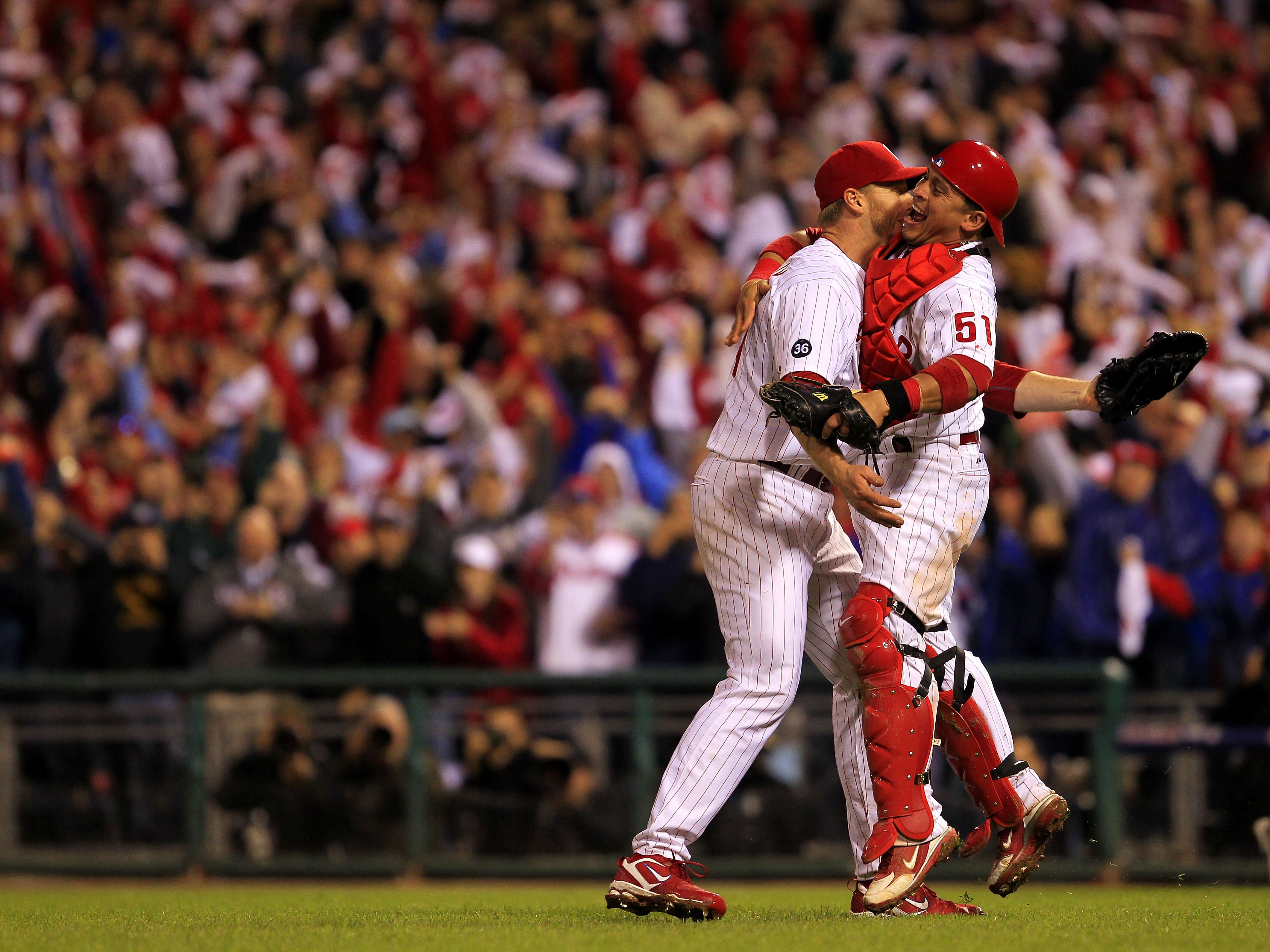 PHILADELPHIA - OCTOBER 06:  Roy Halladay #34 and Carlos Ruiz #51 of the Philadelphia Phillies celebrate Halladay's no-hitter and the win in Game 1 of the NLDS against the Cincinnati Reds at Citizens Bank Park on October 6, 2010 in Philadelphia, Pennsylvan