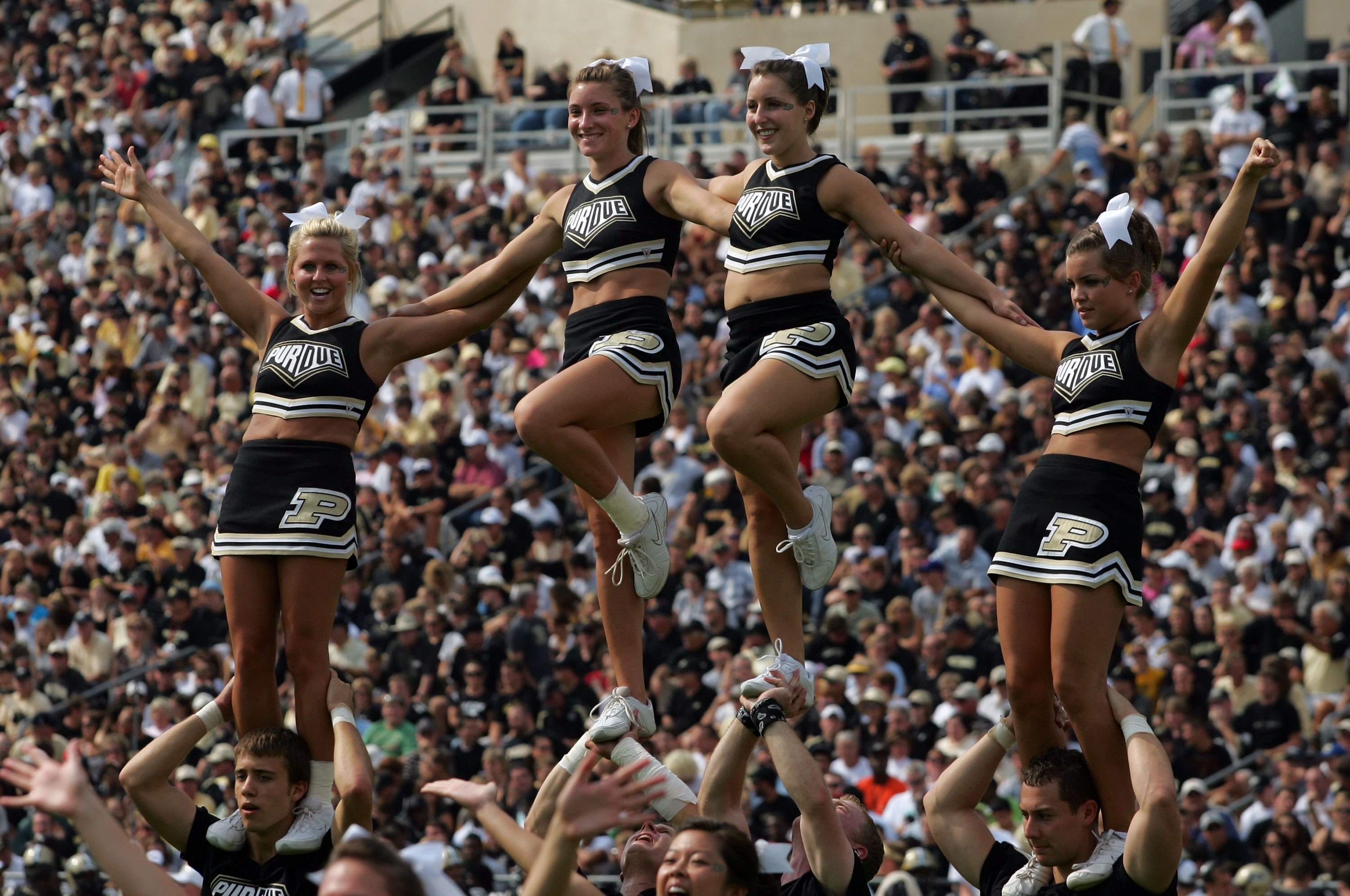WEST LAFAYETTE, IN - SEPTEMBER 20:  Purdue cheerleaders perform during play against the Central Michigan Chippewas and the Purdue Boilermakers at Ross-Ade Stadium on September 20, 2008 in West Lafayette, Indiana.  (Photo by Ronald Martinez/Getty Images)