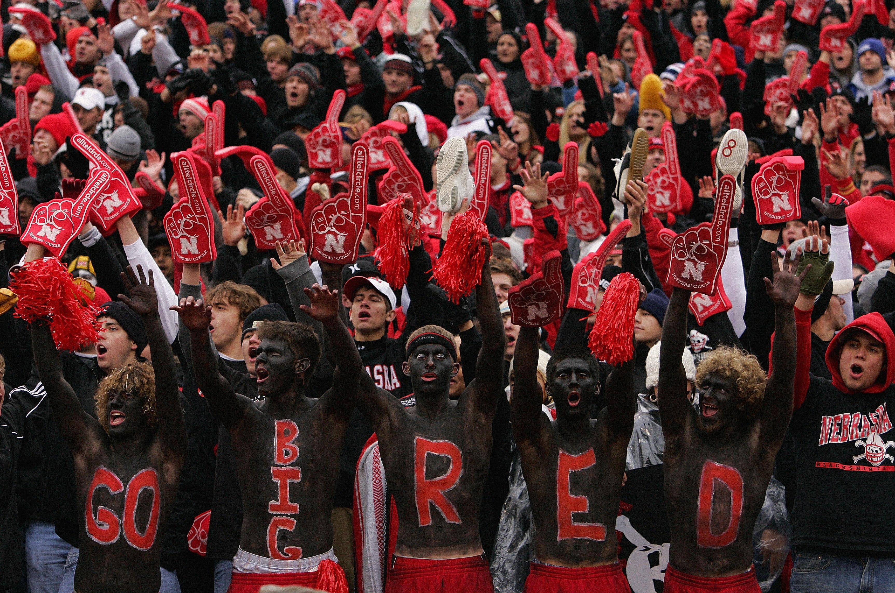 LINCOLN, NE - SEPTEMBER 21:  Fans of the Nebraska Cornhuskers show their support during the game against the Texas Longhorns on October 21, 2006 at Memorial Stadium in Lincoln, Nebraska.  (Photo by Brian Bahr/Getty Images)
