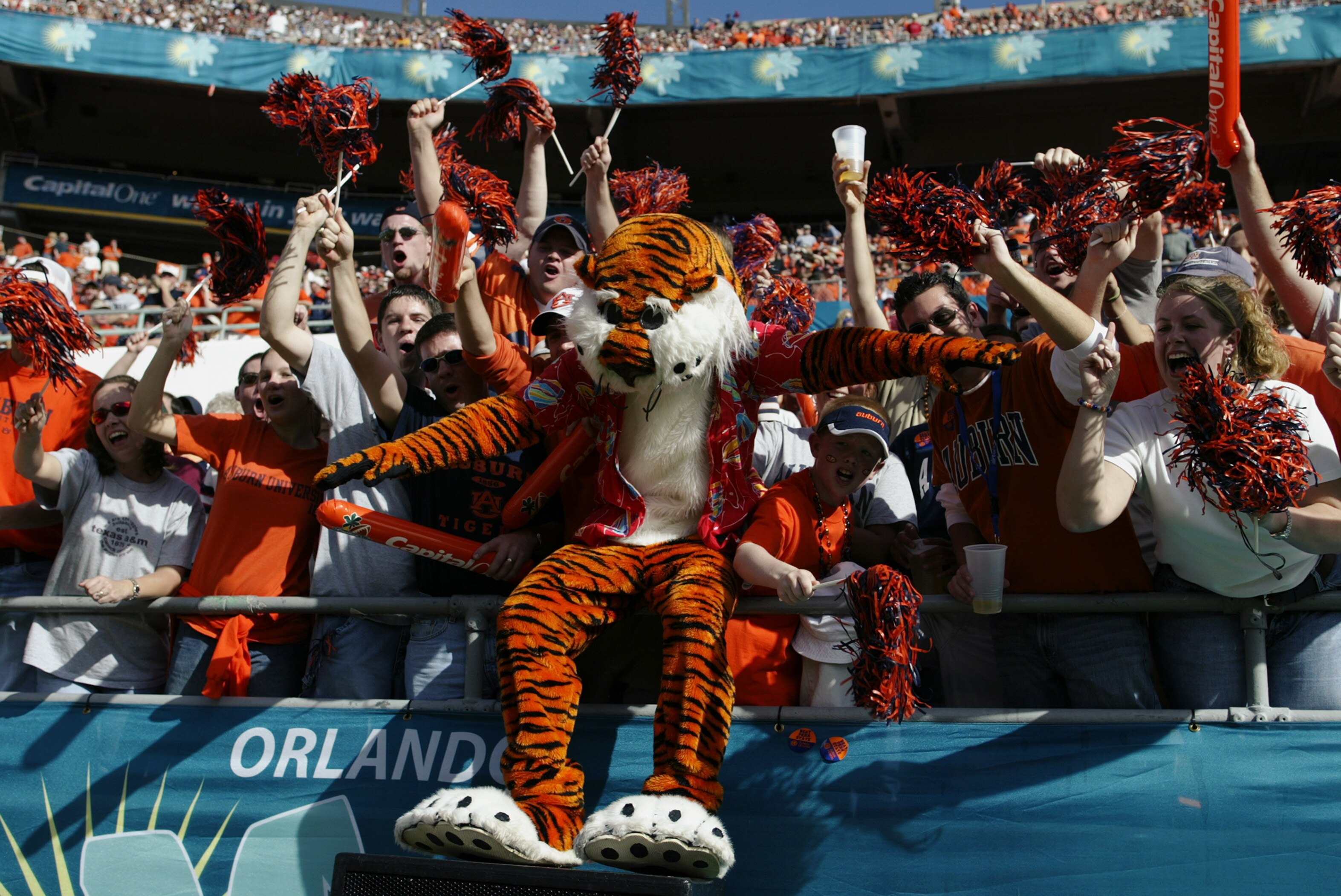 ORLANDO, FL - JANUARY 1:  The Auburn University Tiger celebrates with fans during the Capital One Bowl against the Pennsylvania State University Lions at Florida Citrus Bowl Stadium on January 1, 2003 in Orlando, Florida.  Auburn defeated Penn State 13-9.
