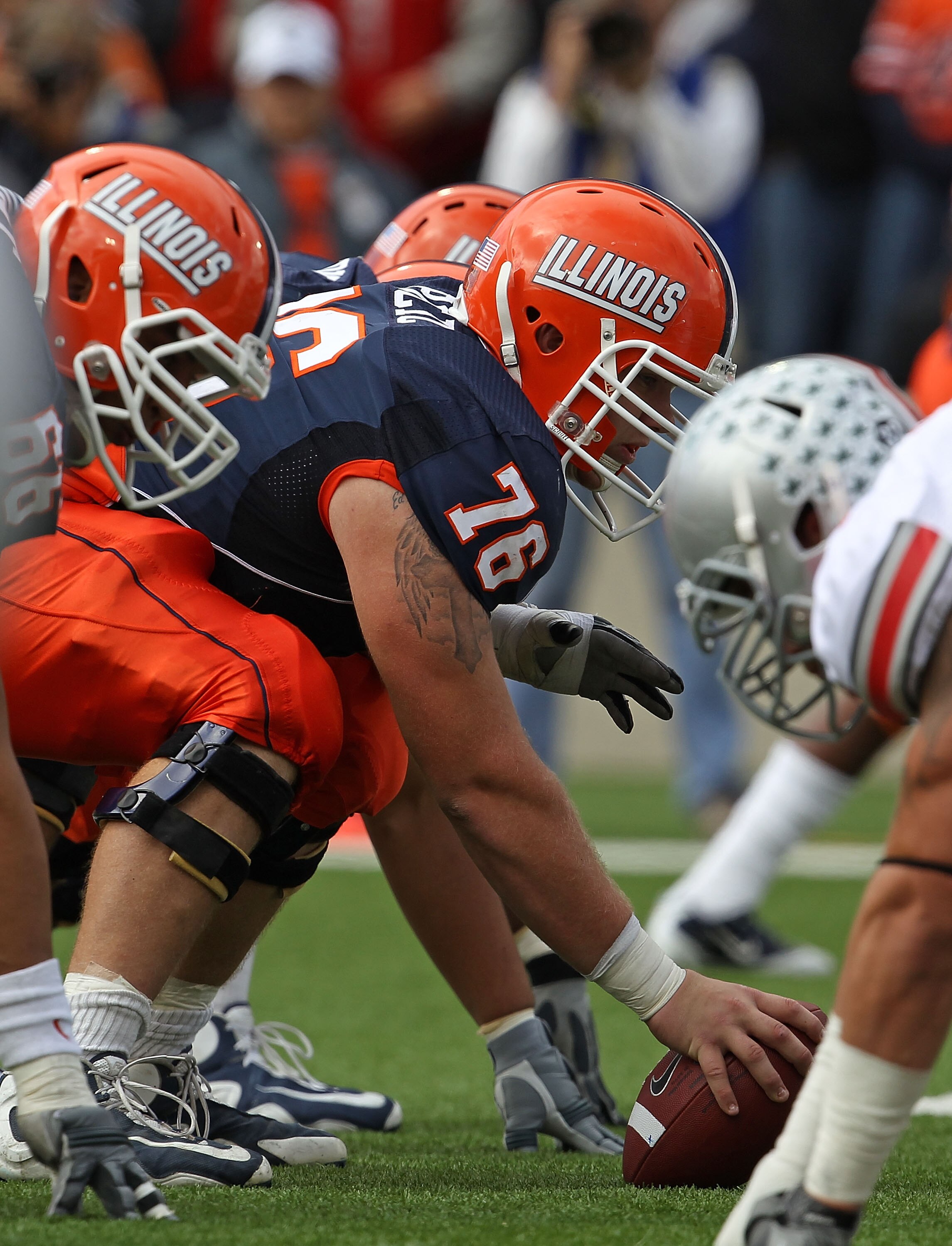 CHAMPAIGN, IL - OCTOBER 02: Graham Pocic #76 of the Illinois Fighting Illini waits to snap the ball against the Ohio State Buckeyes at Memorial Stadium on October 2, 2010 in Champaign, Illinois. Ohio State defeated Illinois 24-13. (Photo by Jonathan Danie