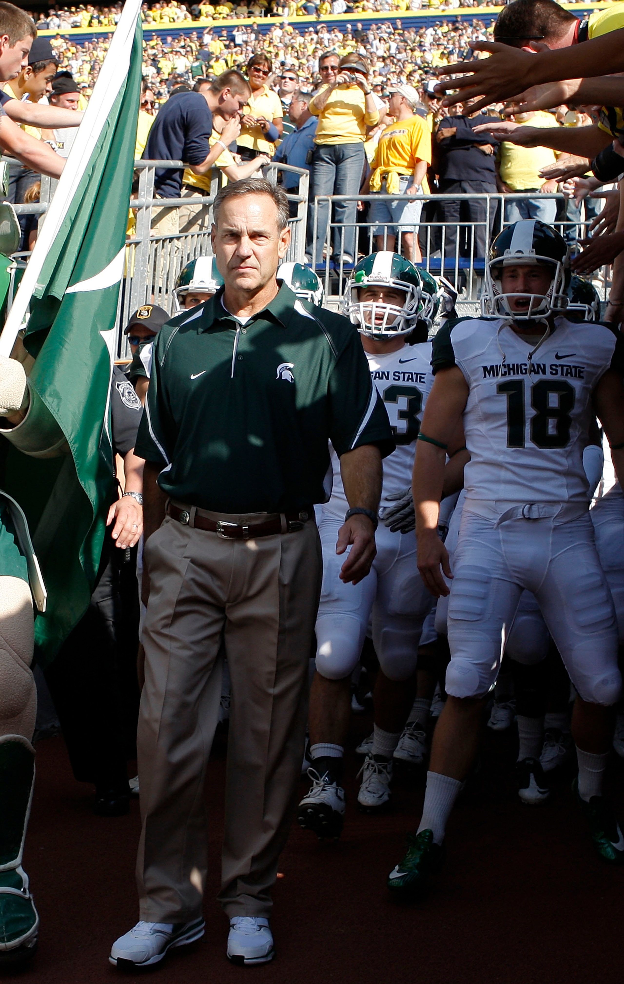 ANN ARBOR, MI - OCTOBER 09: Michigan State head coach Mark Dantonio gets ready to enter the field prior to the start of the game against the Michigan Wolverines October 9, 2010 at Michigan Stadium in Ann Arbor, Michigan. The Spartans defeated the Wolveri ANN ARBOR, MI - OCTOBER 09: Michigan State head coach Mark Dantonio gets ready to enter the field prior to the start of the game against the Michigan Wolverines October 9, 2010 at Michigan Stadium in Ann Arbor, Michigan. The Spartans defeated the Wolveri