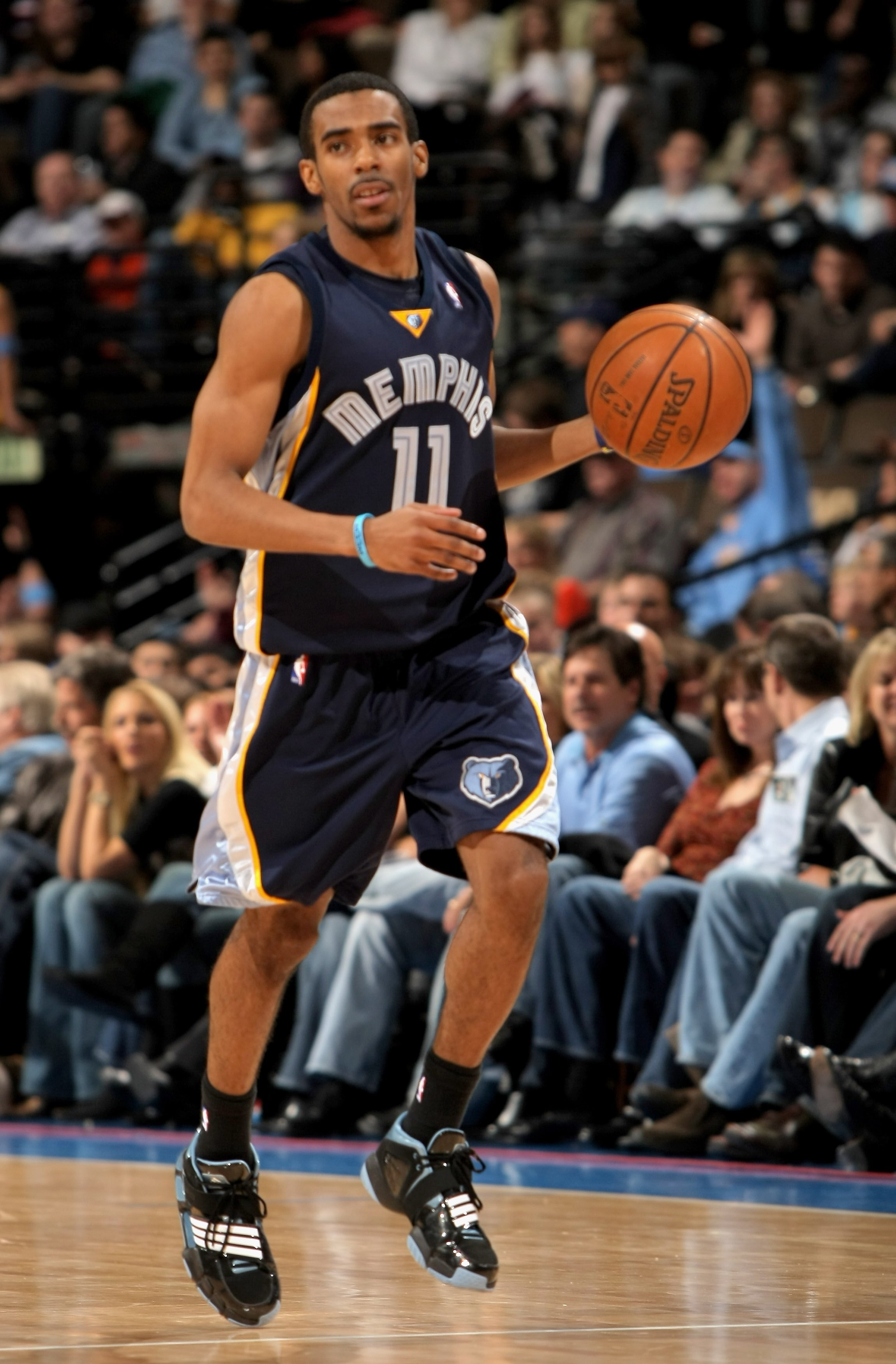 DENVER - APRIL 16:  Mike Conley #11 of the Memphis Grizzlies in action against the Denver Nuggets at the Pepsi Center on April 16, 2008 in Denver, Colorado. The Nuggets defeated the Grizzlies 120-111. NOTE TO USER: User expressly acknowledges and agrees t
